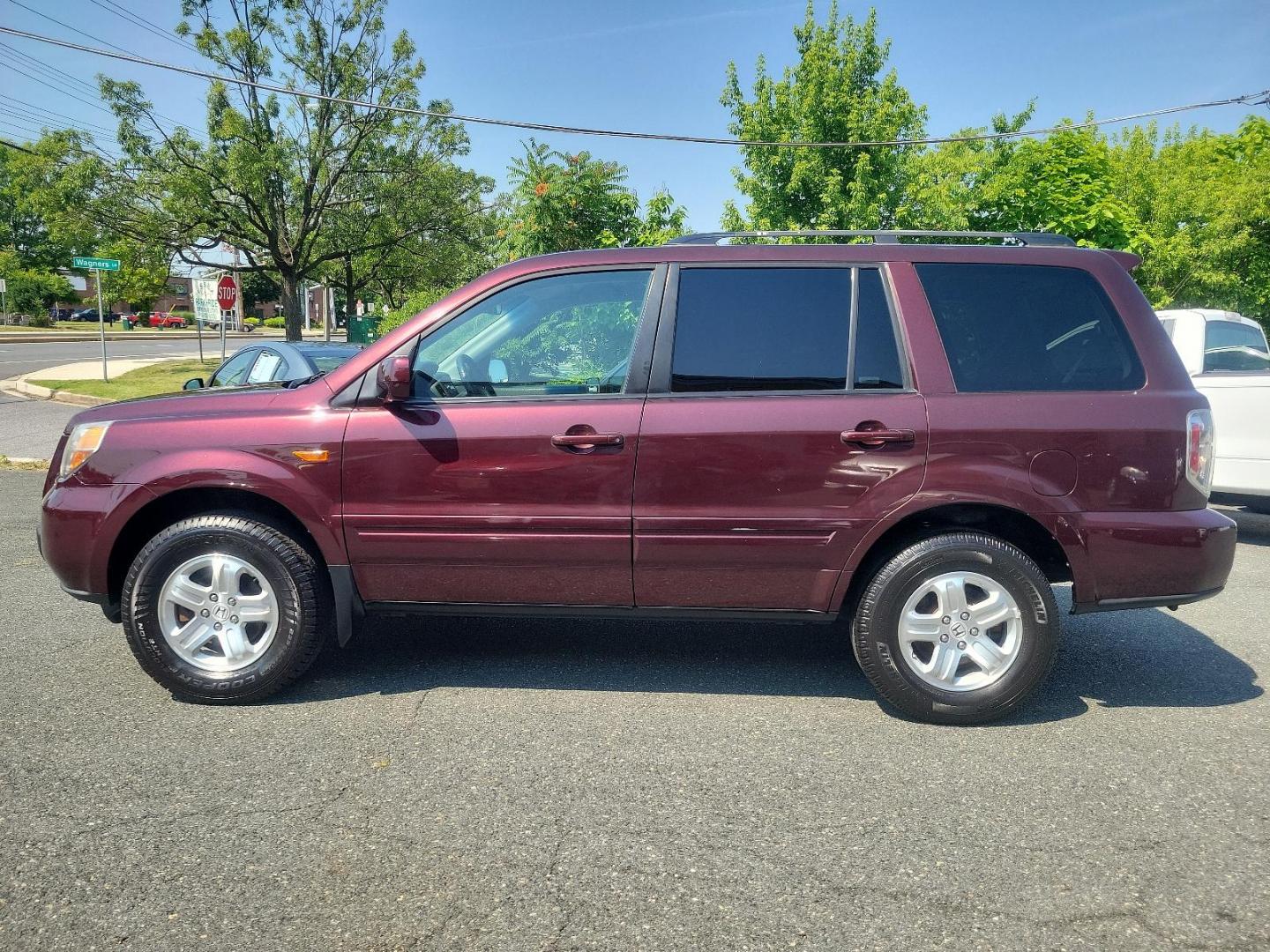 2008 Dark Cherry Pearl - RE /Gray - GR Honda Pilot VP (5FNYF182X8B) with an 3.5L SOHC MPFI 24-valve VTEC V6 engine engine, located at 50 Eastern Blvd., Essex, MD, 21221, (410) 686-3444, 39.304367, -76.484947 - Experience a superior ride with this gorgeous 2008 Honda Pilot VP, donned in a striking maroon exterior. This legendary SUV, equipped with a robust 3.5l SOHC MPFI 24-valve VTEC V6 engine, ensures a smooth yet spirited performance that Honda is renowned for. This 4WD marvel is designed for those who - Photo#6