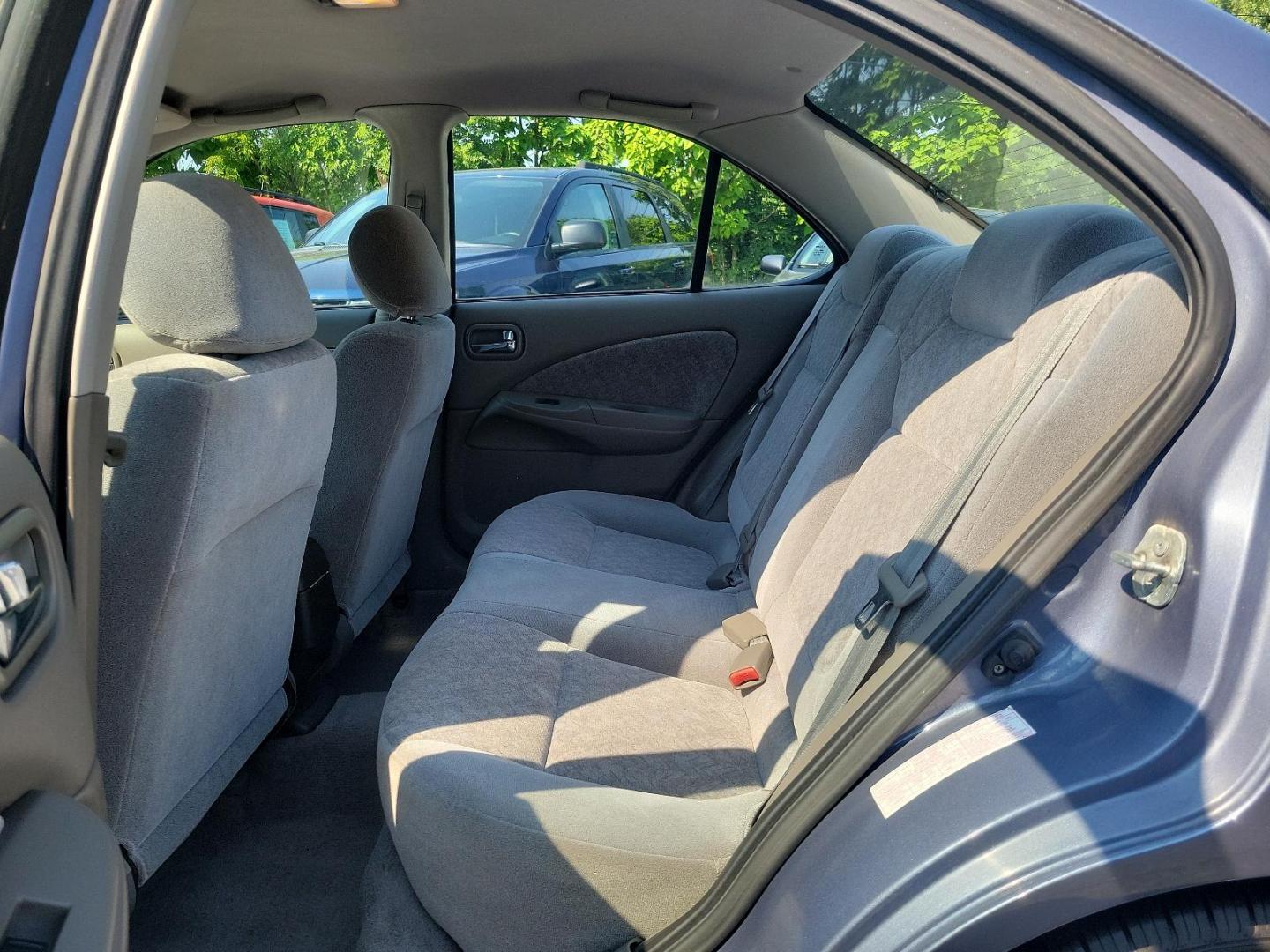 2000 Deja Blue Metallic - BT1 /Stone - X Nissan Sentra GXE (3N1CB51D2YL) with an 1.8L DOHC 16-valve 4-cyl engine engine, located at 50 Eastern Blvd., Essex, MD, 21221, (410) 686-3444, 39.304367, -76.484947 - Introducing the 2000 Nissan Sentra, a blend of performance, functionality, and style. This compact sedan, a standout in its class, boasts a stunning blue exterior that adds a pop of colour to its well-crafted aesthetic. The Sentra is equipped with advanced Japanese engineering known for reliability - Photo#9