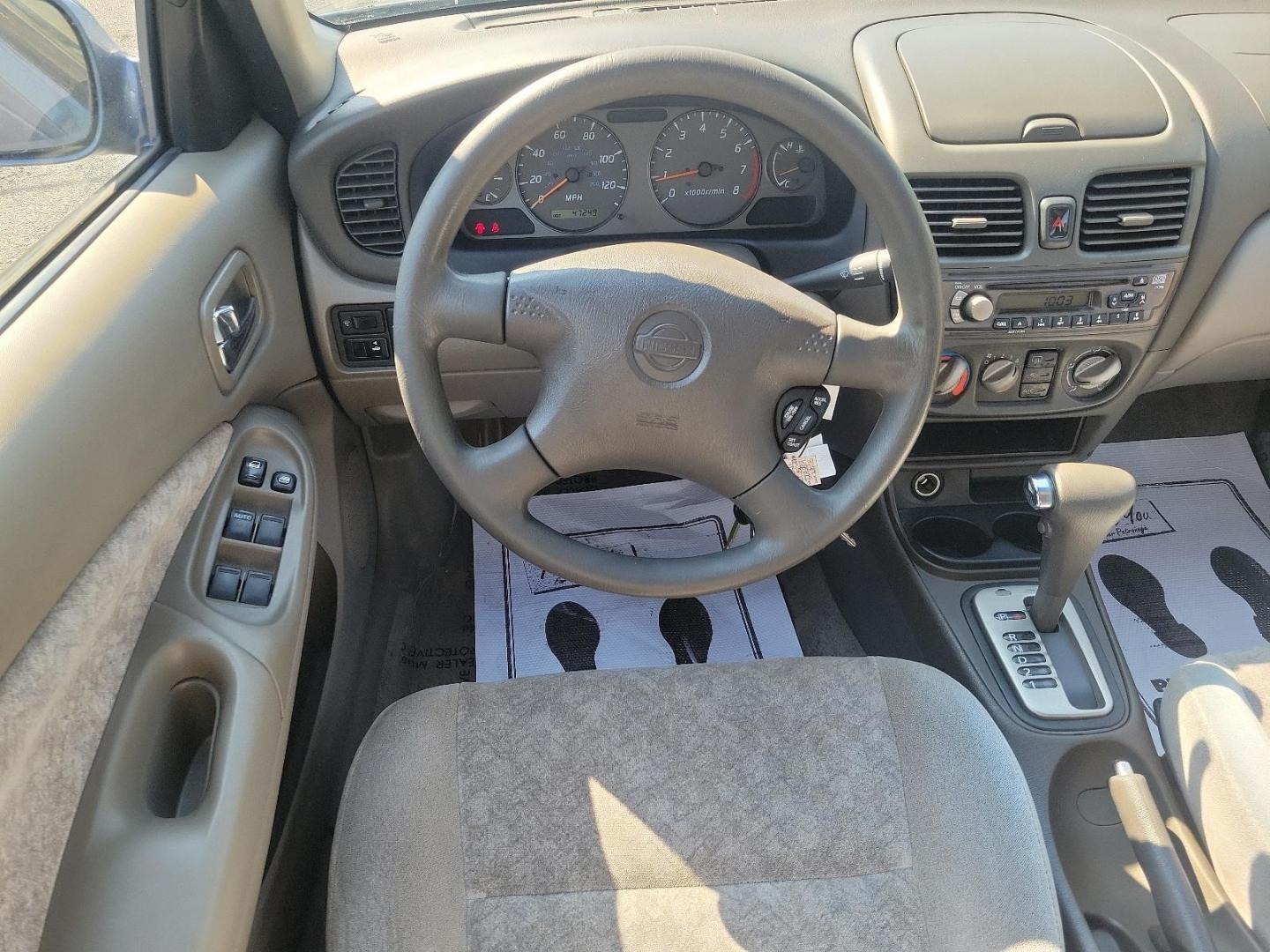 2000 Deja Blue Metallic - BT1 /Stone - X Nissan Sentra GXE (3N1CB51D2YL) with an 1.8L DOHC 16-valve 4-cyl engine engine, located at 50 Eastern Blvd., Essex, MD, 21221, (410) 686-3444, 39.304367, -76.484947 - Introducing the 2000 Nissan Sentra, a blend of performance, functionality, and style. This compact sedan, a standout in its class, boasts a stunning blue exterior that adds a pop of colour to its well-crafted aesthetic. The Sentra is equipped with advanced Japanese engineering known for reliability - Photo#10