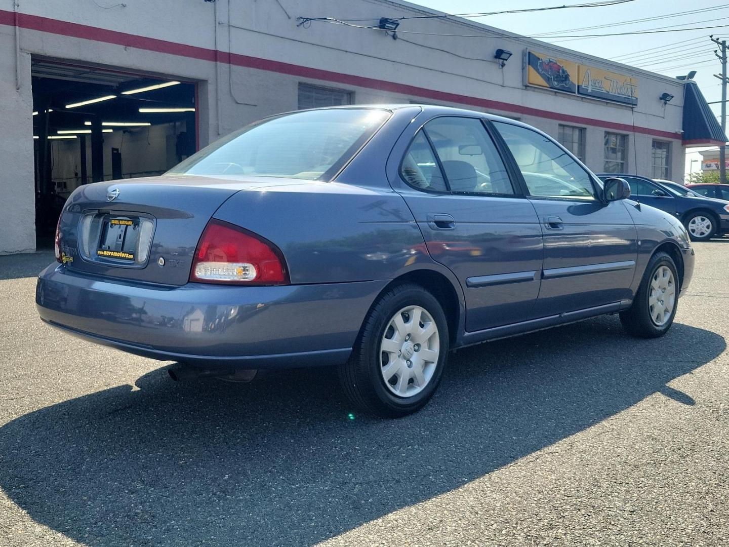 2000 Deja Blue Metallic - BT1 /Stone - X Nissan Sentra GXE (3N1CB51D2YL) with an 1.8L DOHC 16-valve 4-cyl engine engine, located at 50 Eastern Blvd., Essex, MD, 21221, (410) 686-3444, 39.304367, -76.484947 - Introducing the 2000 Nissan Sentra, a blend of performance, functionality, and style. This compact sedan, a standout in its class, boasts a stunning blue exterior that adds a pop of colour to its well-crafted aesthetic. The Sentra is equipped with advanced Japanese engineering known for reliability - Photo#3