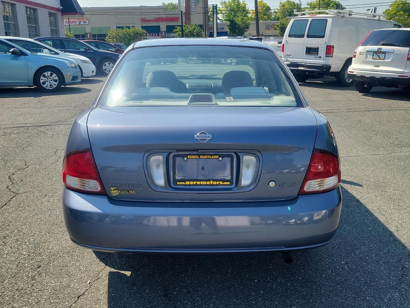 2000 Deja Blue Metallic - BT1 /Stone - X Nissan Sentra GXE (3N1CB51D2YL) with an 1.8L DOHC 16-valve 4-cyl engine engine, located at 50 Eastern Blvd., Essex, MD, 21221, (410) 686-3444, 39.304367, -76.484947 - Introducing the 2000 Nissan Sentra, a blend of performance, functionality, and style. This compact sedan, a standout in its class, boasts a stunning blue exterior that adds a pop of colour to its well-crafted aesthetic. The Sentra is equipped with advanced Japanese engineering known for reliability - Photo#4