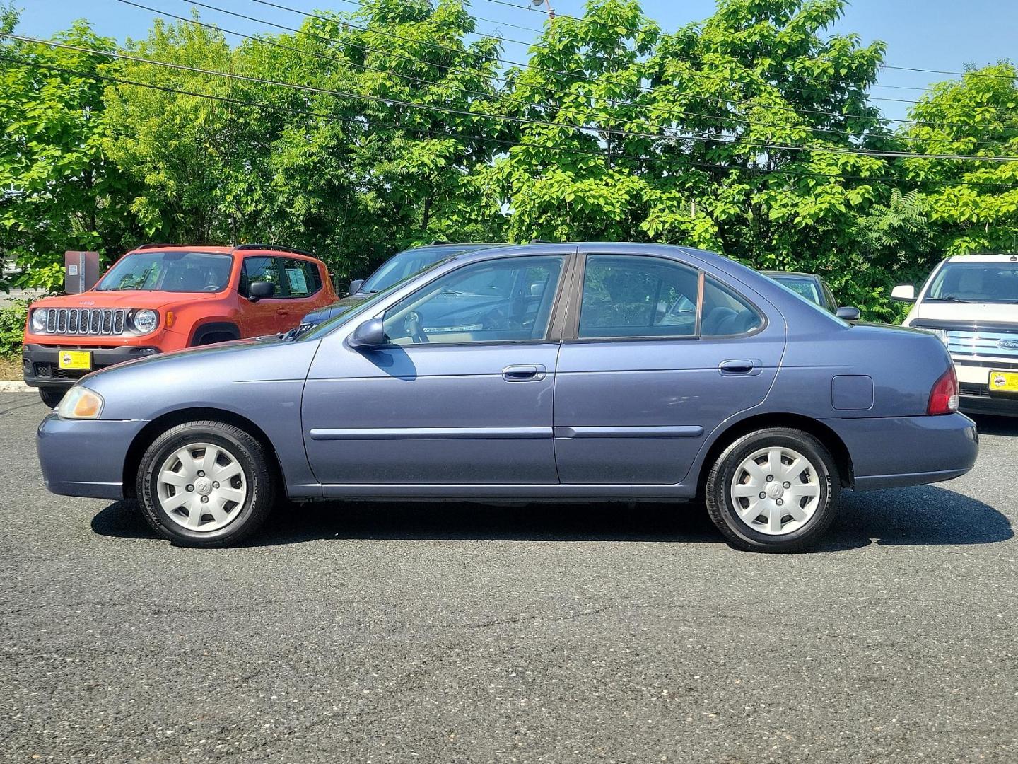 2000 Deja Blue Metallic - BT1 /Stone - X Nissan Sentra GXE (3N1CB51D2YL) with an 1.8L DOHC 16-valve 4-cyl engine engine, located at 50 Eastern Blvd., Essex, MD, 21221, (410) 686-3444, 39.304367, -76.484947 - Introducing the 2000 Nissan Sentra, a blend of performance, functionality, and style. This compact sedan, a standout in its class, boasts a stunning blue exterior that adds a pop of colour to its well-crafted aesthetic. The Sentra is equipped with advanced Japanese engineering known for reliability - Photo#6