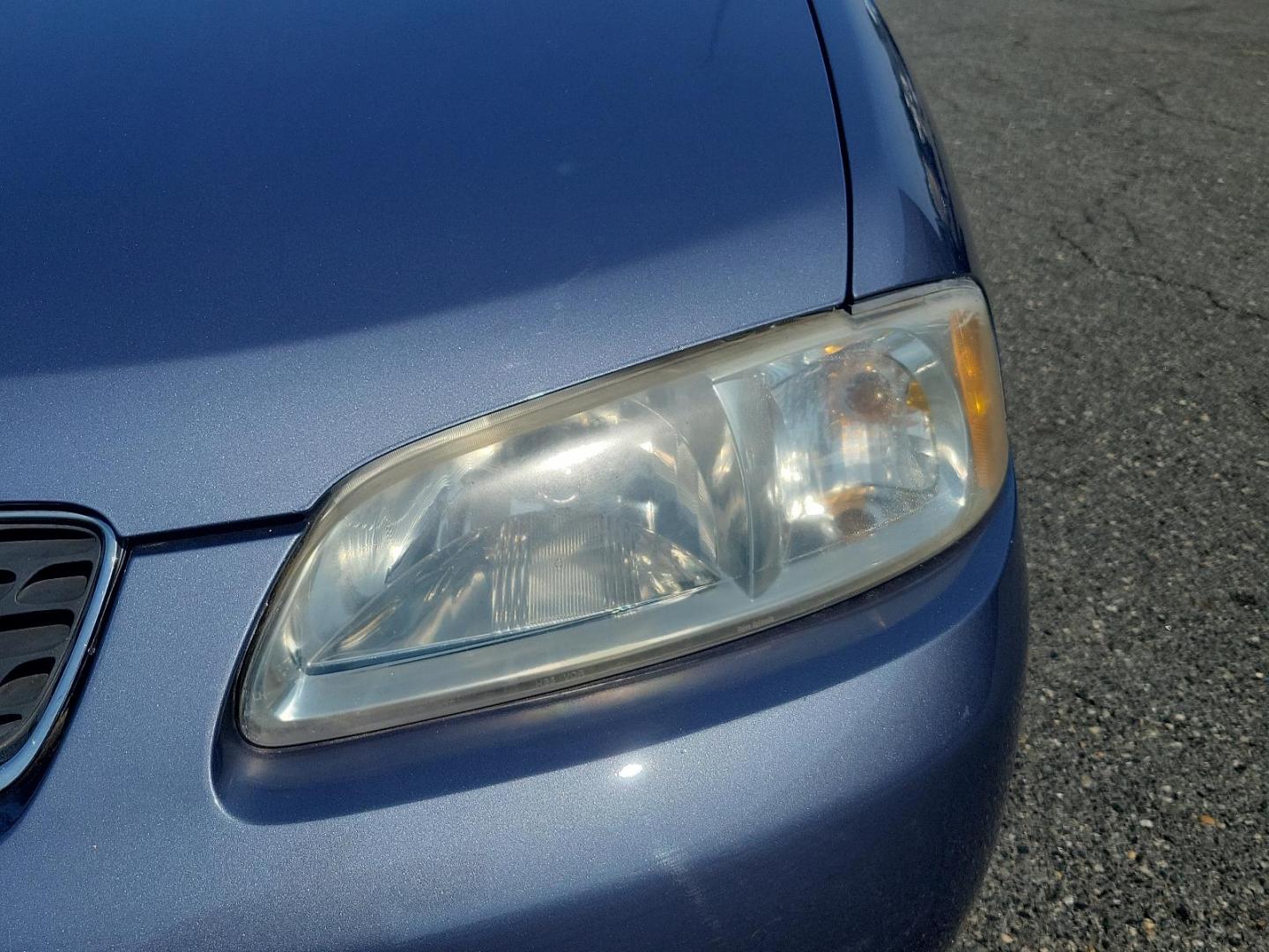 2000 Deja Blue Metallic - BT1 /Stone - X Nissan Sentra GXE (3N1CB51D2YL) with an 1.8L DOHC 16-valve 4-cyl engine engine, located at 50 Eastern Blvd., Essex, MD, 21221, (410) 686-3444, 39.304367, -76.484947 - Introducing the 2000 Nissan Sentra, a blend of performance, functionality, and style. This compact sedan, a standout in its class, boasts a stunning blue exterior that adds a pop of colour to its well-crafted aesthetic. The Sentra is equipped with advanced Japanese engineering known for reliability - Photo#8