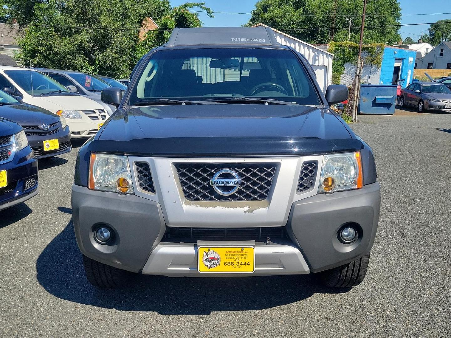 2009 Night Armor - K26 /Graphite - K Nissan Xterra SE (5N1AN08W69C) with an 4.0L DOHC 24-valve V6 engine w/continuous variable valve timing engine, located at 50 Eastern Blvd., Essex, MD, 21221, (410) 686-3444, 39.304367, -76.484947 - Presenting the distinguished 2009 Nissan Xterra, a superb blend of style, durability and efficiency. Coated in a subtle yet handsome gray exterior, the Xterra exudes an aura of sophistication. This powerful sports utility vehicle provides a superior driving experience with its robust framework and w - Photo#1