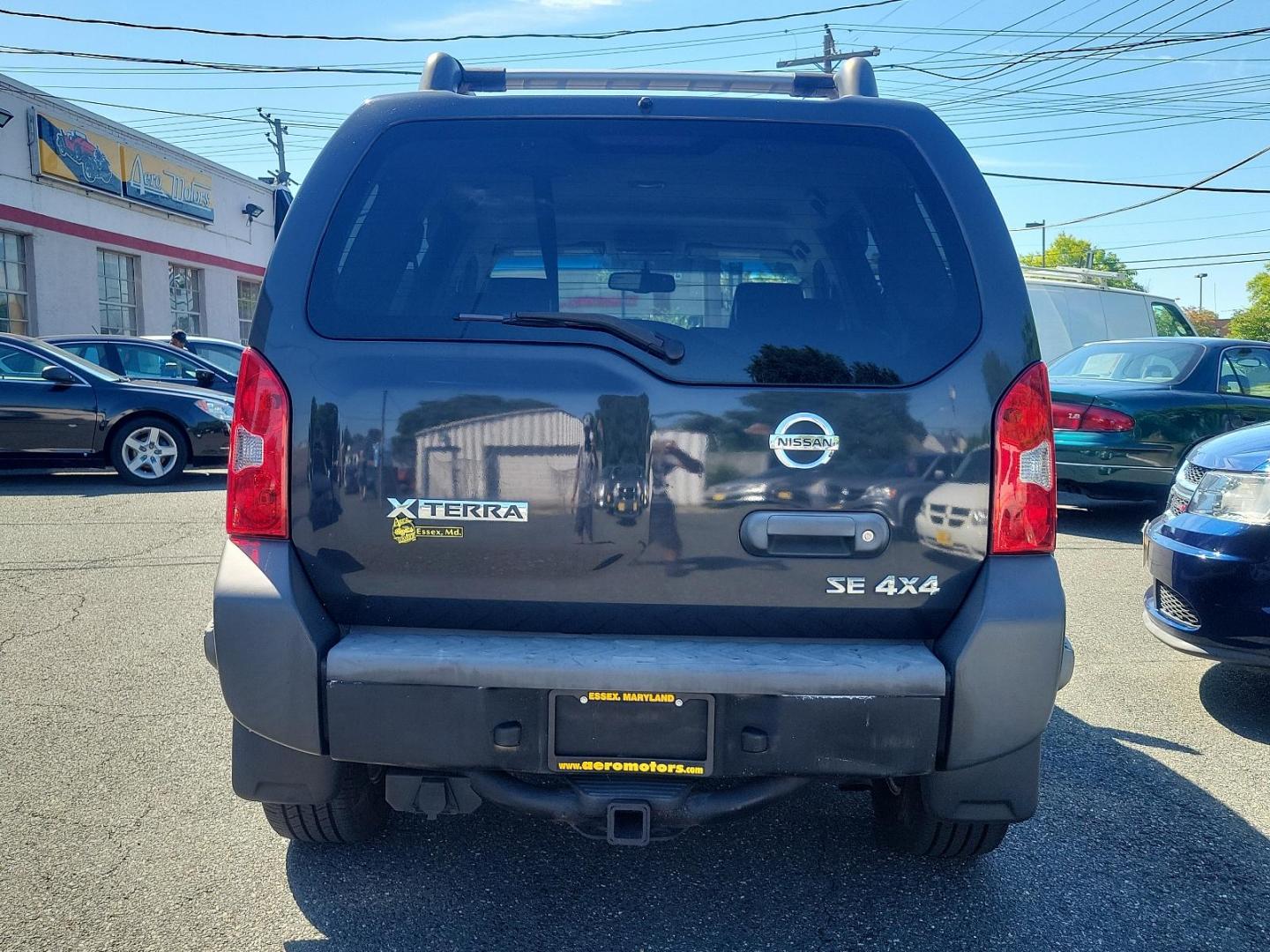 2009 Night Armor - K26 /Graphite - K Nissan Xterra SE (5N1AN08W69C) with an 4.0L DOHC 24-valve V6 engine w/continuous variable valve timing engine, located at 50 Eastern Blvd., Essex, MD, 21221, (410) 686-3444, 39.304367, -76.484947 - Presenting the distinguished 2009 Nissan Xterra, a superb blend of style, durability and efficiency. Coated in a subtle yet handsome gray exterior, the Xterra exudes an aura of sophistication. This powerful sports utility vehicle provides a superior driving experience with its robust framework and w - Photo#4