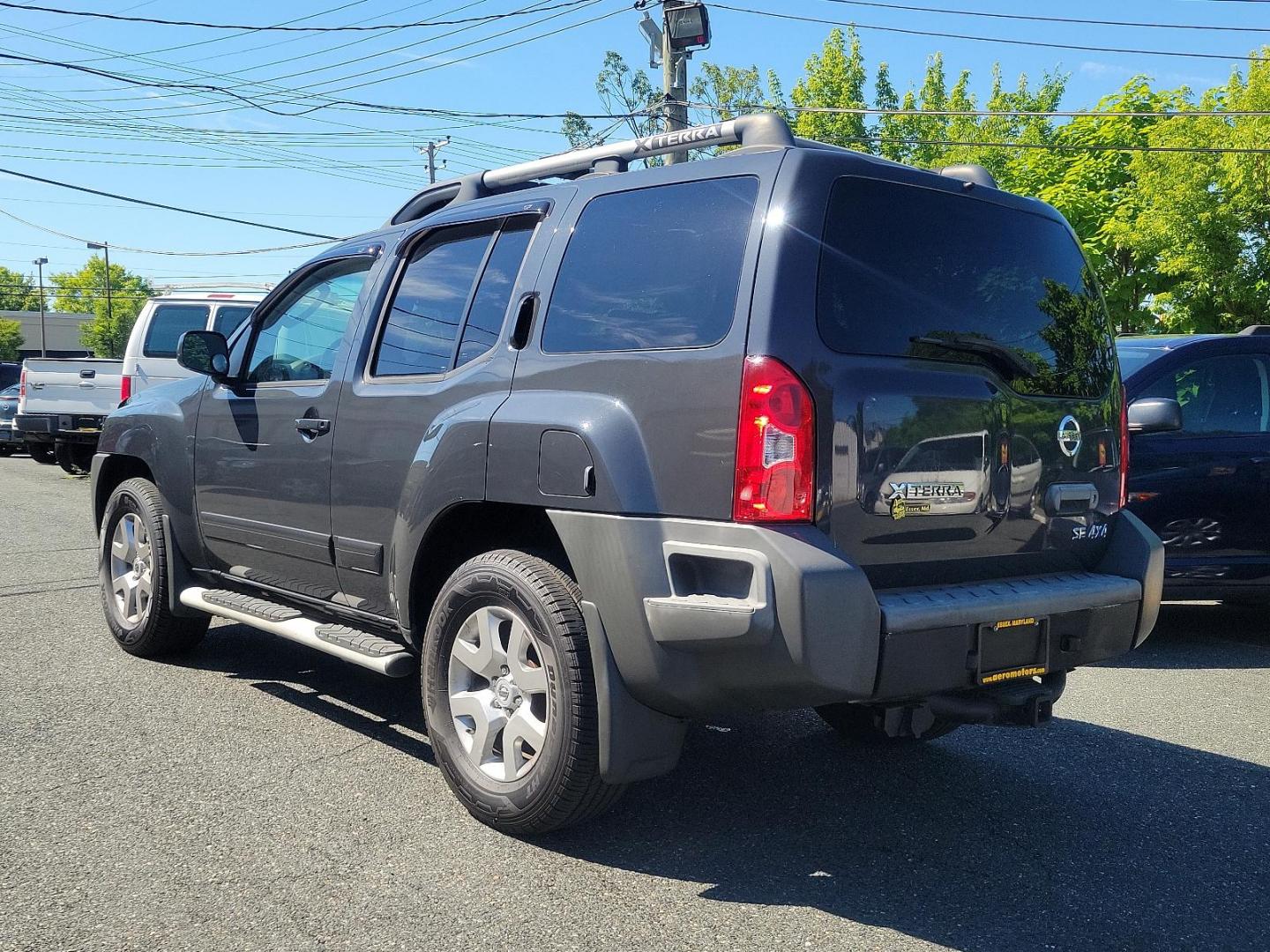 2009 Night Armor - K26 /Graphite - K Nissan Xterra SE (5N1AN08W69C) with an 4.0L DOHC 24-valve V6 engine w/continuous variable valve timing engine, located at 50 Eastern Blvd., Essex, MD, 21221, (410) 686-3444, 39.304367, -76.484947 - Presenting the distinguished 2009 Nissan Xterra, a superb blend of style, durability and efficiency. Coated in a subtle yet handsome gray exterior, the Xterra exudes an aura of sophistication. This powerful sports utility vehicle provides a superior driving experience with its robust framework and w - Photo#5