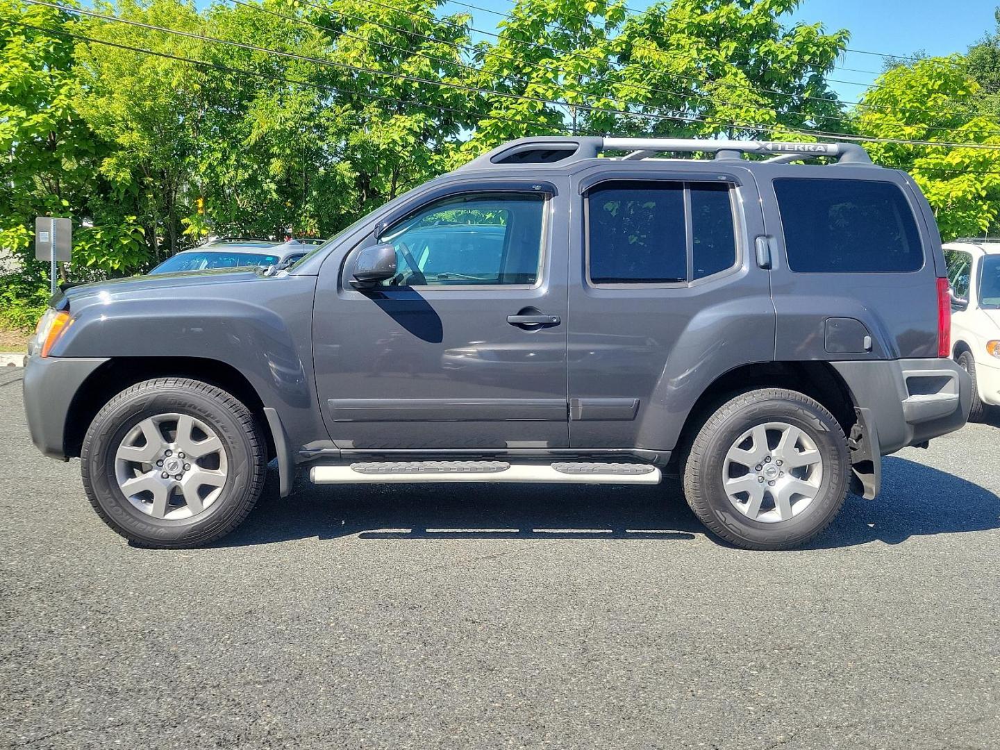 2009 Night Armor - K26 /Graphite - K Nissan Xterra SE (5N1AN08W69C) with an 4.0L DOHC 24-valve V6 engine w/continuous variable valve timing engine, located at 50 Eastern Blvd., Essex, MD, 21221, (410) 686-3444, 39.304367, -76.484947 - Presenting the distinguished 2009 Nissan Xterra, a superb blend of style, durability and efficiency. Coated in a subtle yet handsome gray exterior, the Xterra exudes an aura of sophistication. This powerful sports utility vehicle provides a superior driving experience with its robust framework and w - Photo#6