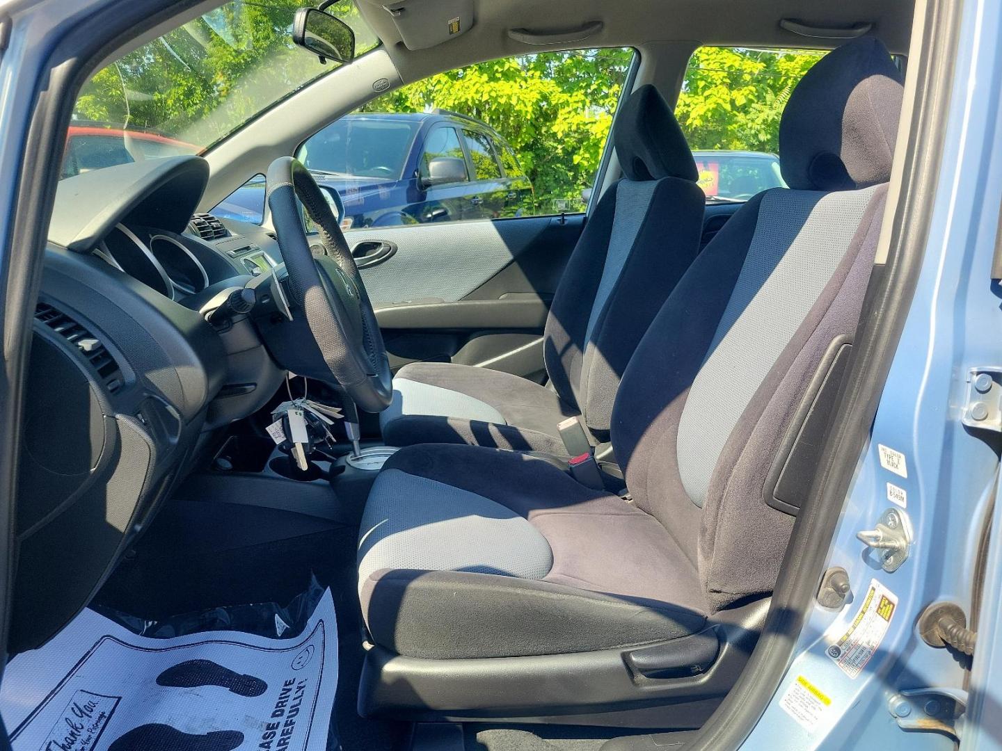 2008 Tidewater Blue Metallic - BU /Black - BK Honda Fit Sport (JHMGD38678S) with an 1.5L SOHC MPFI 16-valve VTEC I4 engine engine, located at 50 Eastern Blvd., Essex, MD, 21221, (410) 686-3444, 39.304367, -76.484947 - Introducing the 2008 Honda Fit Sport 5dr hb auto sport, a perfect blend of efficiency, power, and style. Hued in a striking blue exterior, this compact yet powerful car is a versatile choice for city dwellers and road-trip enthusiasts alike. Powered by a 1.5l sohc mpfi 16-valve vtec i4 engine, it dy - Photo#12