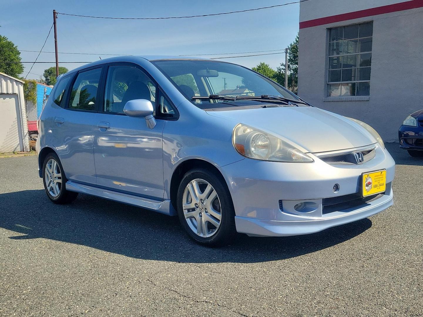 2008 Tidewater Blue Metallic - BU /Black - BK Honda Fit Sport (JHMGD38678S) with an 1.5L SOHC MPFI 16-valve VTEC I4 engine engine, located at 50 Eastern Blvd., Essex, MD, 21221, (410) 686-3444, 39.304367, -76.484947 - Introducing the 2008 Honda Fit Sport 5dr hb auto sport, a perfect blend of efficiency, power, and style. Hued in a striking blue exterior, this compact yet powerful car is a versatile choice for city dwellers and road-trip enthusiasts alike. Powered by a 1.5l sohc mpfi 16-valve vtec i4 engine, it dy - Photo#2