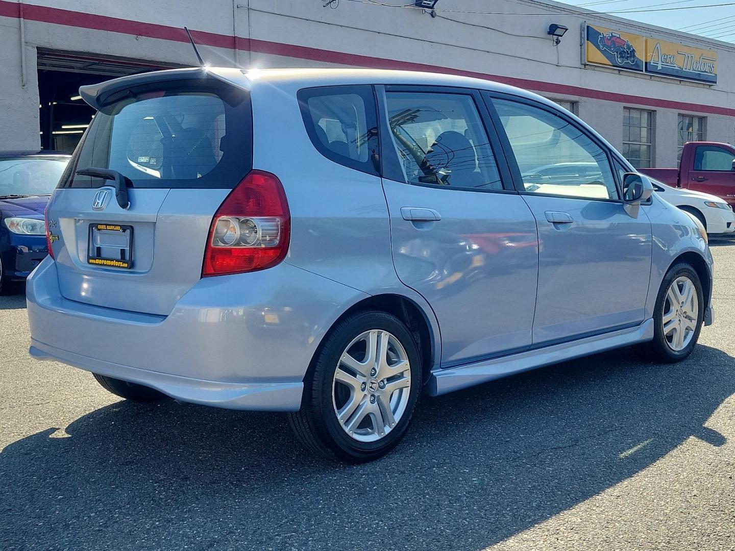 2008 Tidewater Blue Metallic - BU /Black - BK Honda Fit Sport (JHMGD38678S) with an 1.5L SOHC MPFI 16-valve VTEC I4 engine engine, located at 50 Eastern Blvd., Essex, MD, 21221, (410) 686-3444, 39.304367, -76.484947 - Introducing the 2008 Honda Fit Sport 5dr hb auto sport, a perfect blend of efficiency, power, and style. Hued in a striking blue exterior, this compact yet powerful car is a versatile choice for city dwellers and road-trip enthusiasts alike. Powered by a 1.5l sohc mpfi 16-valve vtec i4 engine, it dy - Photo#3