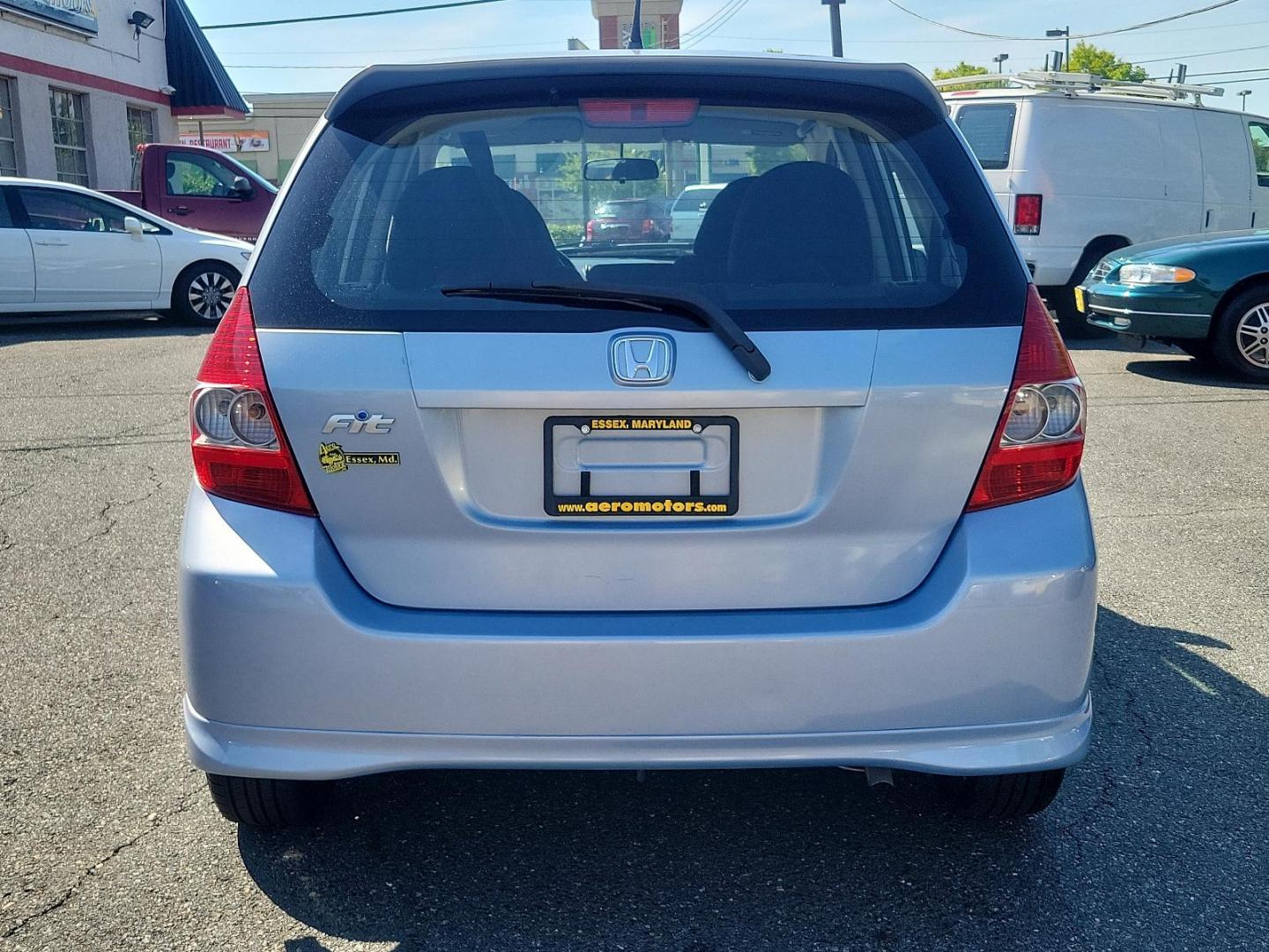 2008 Tidewater Blue Metallic - BU /Black - BK Honda Fit Sport (JHMGD38678S) with an 1.5L SOHC MPFI 16-valve VTEC I4 engine engine, located at 50 Eastern Blvd., Essex, MD, 21221, (410) 686-3444, 39.304367, -76.484947 - Introducing the 2008 Honda Fit Sport 5dr hb auto sport, a perfect blend of efficiency, power, and style. Hued in a striking blue exterior, this compact yet powerful car is a versatile choice for city dwellers and road-trip enthusiasts alike. Powered by a 1.5l sohc mpfi 16-valve vtec i4 engine, it dy - Photo#4