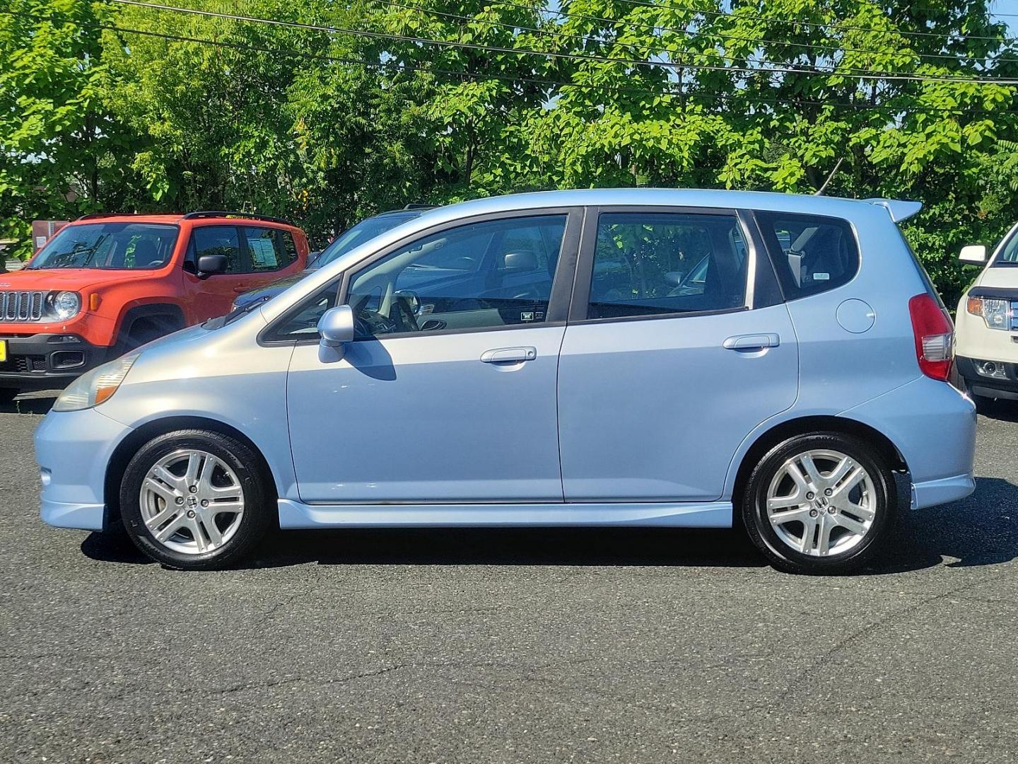 2008 Tidewater Blue Metallic - BU /Black - BK Honda Fit Sport (JHMGD38678S) with an 1.5L SOHC MPFI 16-valve VTEC I4 engine engine, located at 50 Eastern Blvd., Essex, MD, 21221, (410) 686-3444, 39.304367, -76.484947 - Introducing the 2008 Honda Fit Sport 5dr hb auto sport, a perfect blend of efficiency, power, and style. Hued in a striking blue exterior, this compact yet powerful car is a versatile choice for city dwellers and road-trip enthusiasts alike. Powered by a 1.5l sohc mpfi 16-valve vtec i4 engine, it dy - Photo#6