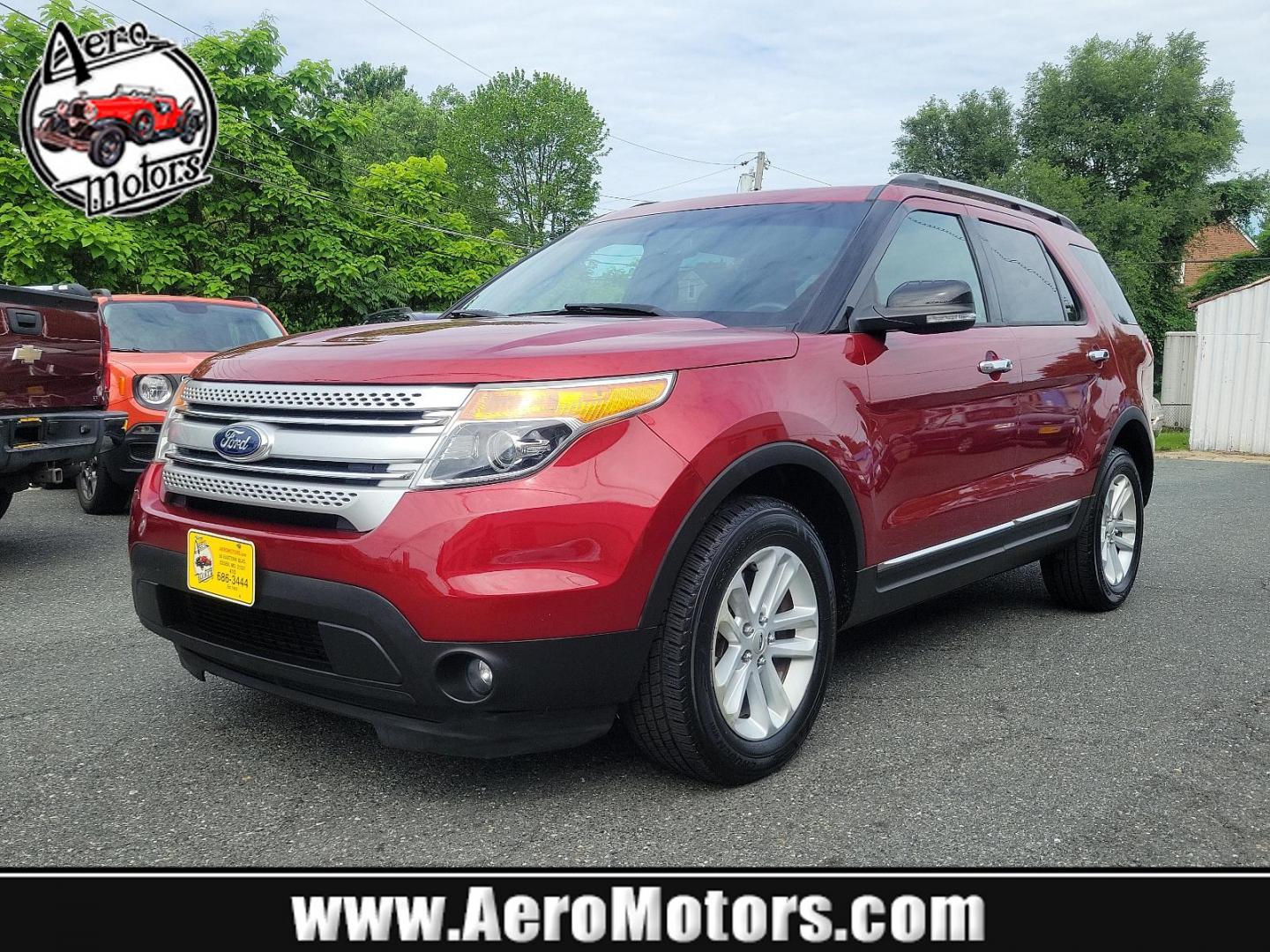 2014 Ruby Red Metallic Tinted Clearcoat - RR /Charcoal Black - 8W Ford Explorer XLT (1FM5K8D85EG) with an ENGINE: 3.5L TI-VCT V6 engine, located at 50 Eastern Blvd., Essex, MD, 21221, (410) 686-3444, 39.304367, -76.484947 - Step into the world of adventure with this immaculate 2014 Ford Explorer XLT 4WD 4DR. Impeccably mantained and bathed in striking Ruby Red metallic tinted clearcoat, this robust vehicle promises not only performance but style as well. Replete with a plush Charcoal Black interior, an aesthetic that f - Photo#0