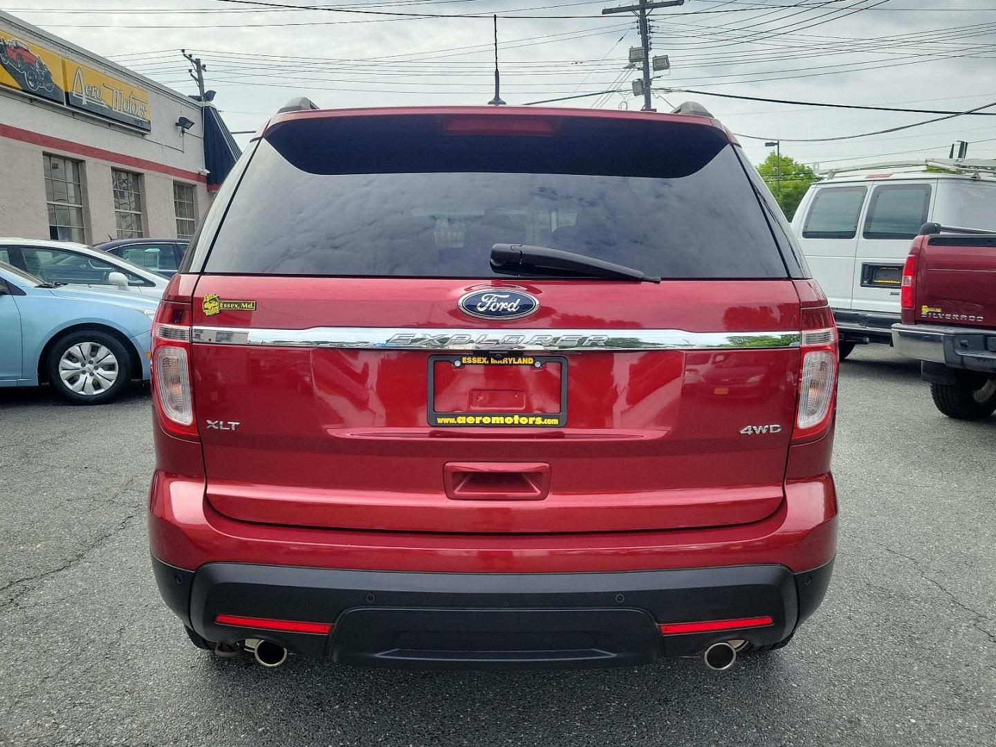 2014 Ruby Red Metallic Tinted Clearcoat - RR /Charcoal Black - 8W Ford Explorer XLT (1FM5K8D85EG) with an ENGINE: 3.5L TI-VCT V6 engine, located at 50 Eastern Blvd., Essex, MD, 21221, (410) 686-3444, 39.304367, -76.484947 - Step into the world of adventure with this immaculate 2014 Ford Explorer XLT 4WD 4DR. Impeccably mantained and bathed in striking Ruby Red metallic tinted clearcoat, this robust vehicle promises not only performance but style as well. Replete with a plush Charcoal Black interior, an aesthetic that f - Photo#4