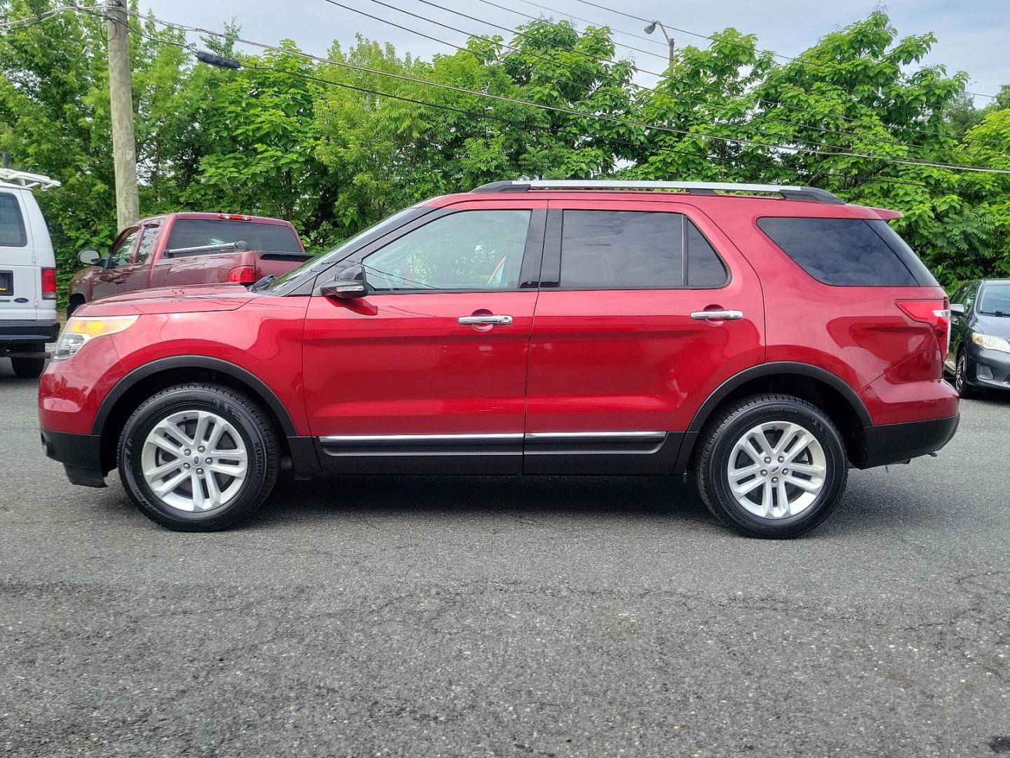 2014 Ruby Red Metallic Tinted Clearcoat - RR /Charcoal Black - 8W Ford Explorer XLT (1FM5K8D85EG) with an ENGINE: 3.5L TI-VCT V6 engine, located at 50 Eastern Blvd., Essex, MD, 21221, (410) 686-3444, 39.304367, -76.484947 - Step into the world of adventure with this immaculate 2014 Ford Explorer XLT 4WD 4DR. Impeccably mantained and bathed in striking Ruby Red metallic tinted clearcoat, this robust vehicle promises not only performance but style as well. Replete with a plush Charcoal Black interior, an aesthetic that f - Photo#6