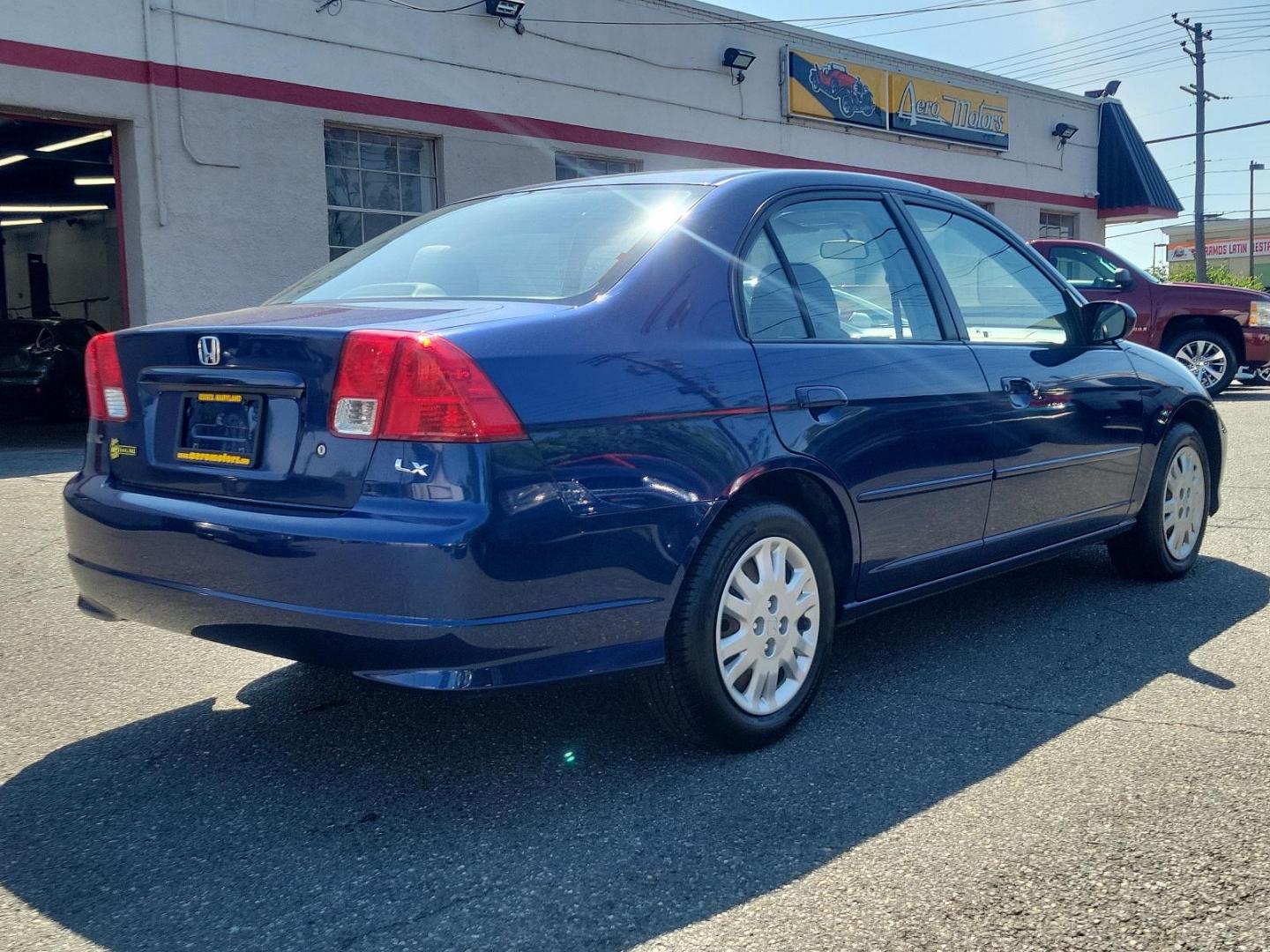 2004 Blue Pearl - BL /Gray - GR Honda Civic LX (2HGES16524H) with an 1.7L SOHC MPFI 16-valve I4 engine engine, located at 50 Eastern Blvd., Essex, MD, 21221, (410) 686-3444, 39.304367, -76.484947 - Photo#3