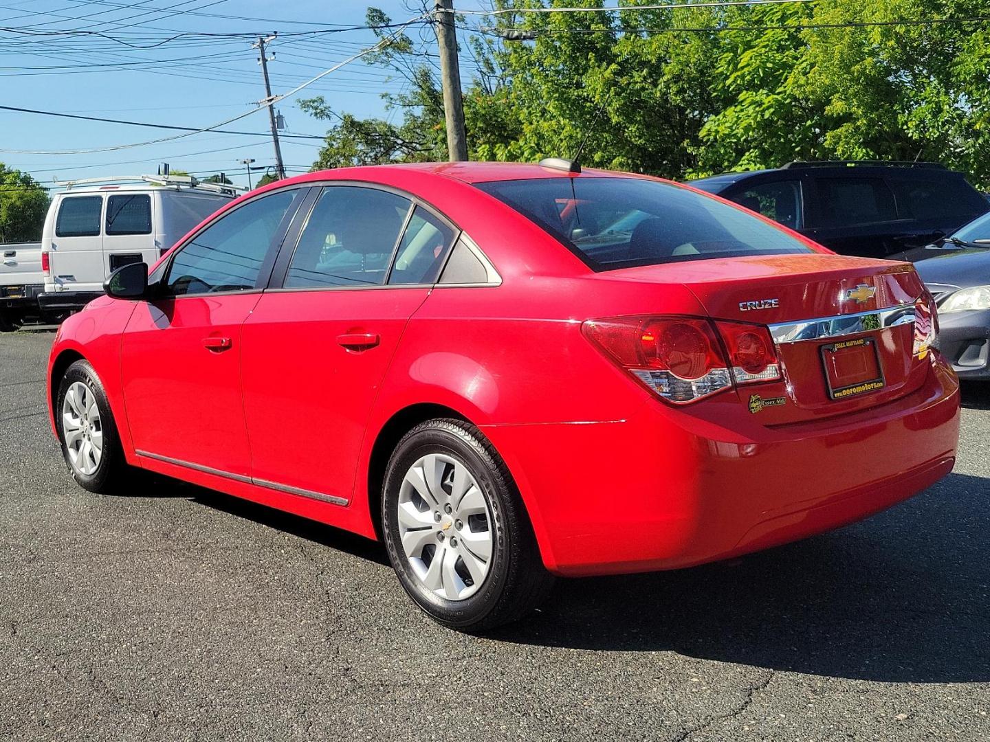 2015 Red Hot - G7C /Jet Black/Medium Titanium - AFB Chevrolet Cruze LS (1G1PA5SG4F7) with an ENGINE, ECOTEC 1.8L VARIABLE VALVE TIMING DOHC 4-CYLINDER SEQUENTIAL MFI engine, located at 50 Eastern Blvd., Essex, MD, 21221, (410) 686-3444, 39.304367, -76.484947 - Experience the ideal blend of performance, comfort, and style with our 2015 Chevrolet Cruze LS 4dr Sdn Auto LS. Brought to life in an eye-catching Red Hot - G7C exterior, this sleek sedan echoes sophistication. The interior is just as compelling, featuring a Jet Black/Medium Titanium - AFB that exud - Photo#5