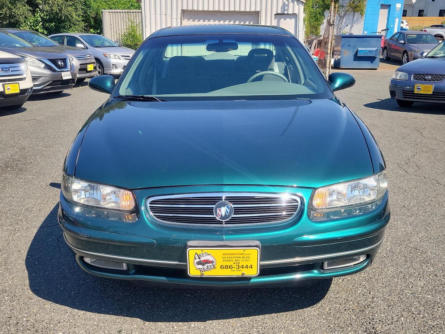 2000 Jasper Green Metallic - 56U /Medium Gray - 14 Buick Regal LS (2G4WB52KXY1) with an 3.8L (231) SFI V6 3800 SERIES II ENGINE engine, located at 50 Eastern Blvd., Essex, MD, 21221, (410) 686-3444, 39.304367, -76.484947 - Presenting the elegant 2000 Buick Regal LS 4dr, finished in a majestic Jasper Green Metallic - 56u exterior, complemented by a sophisticated Medium Gray - 14 interior, exuding an undeniable timeless charm. In its heart, lies an impressive 3.8L (231) SFI V6 3800 Series II engine, merging power and pe - Photo#1