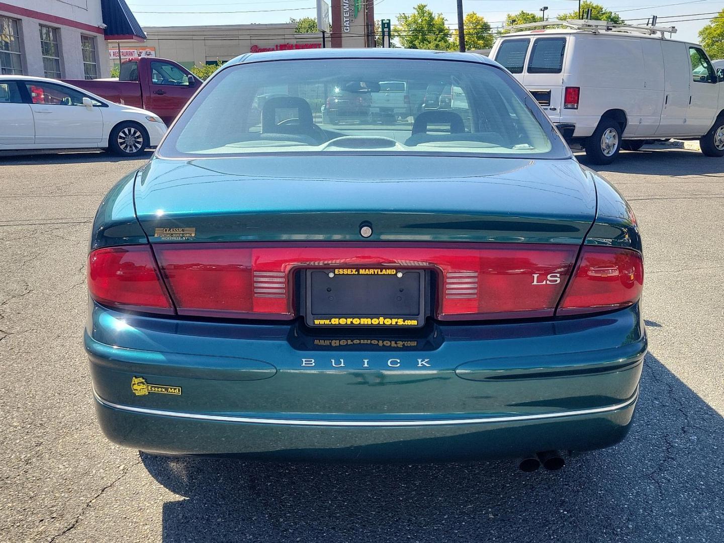 2000 Jasper Green Metallic - 56U /Medium Gray - 14 Buick Regal LS (2G4WB52KXY1) with an 3.8L (231) SFI V6 3800 SERIES II ENGINE engine, located at 50 Eastern Blvd., Essex, MD, 21221, (410) 686-3444, 39.304367, -76.484947 - Presenting the elegant 2000 Buick Regal LS 4dr, finished in a majestic Jasper Green Metallic - 56u exterior, complemented by a sophisticated Medium Gray - 14 interior, exuding an undeniable timeless charm. In its heart, lies an impressive 3.8L (231) SFI V6 3800 Series II engine, merging power and pe - Photo#4