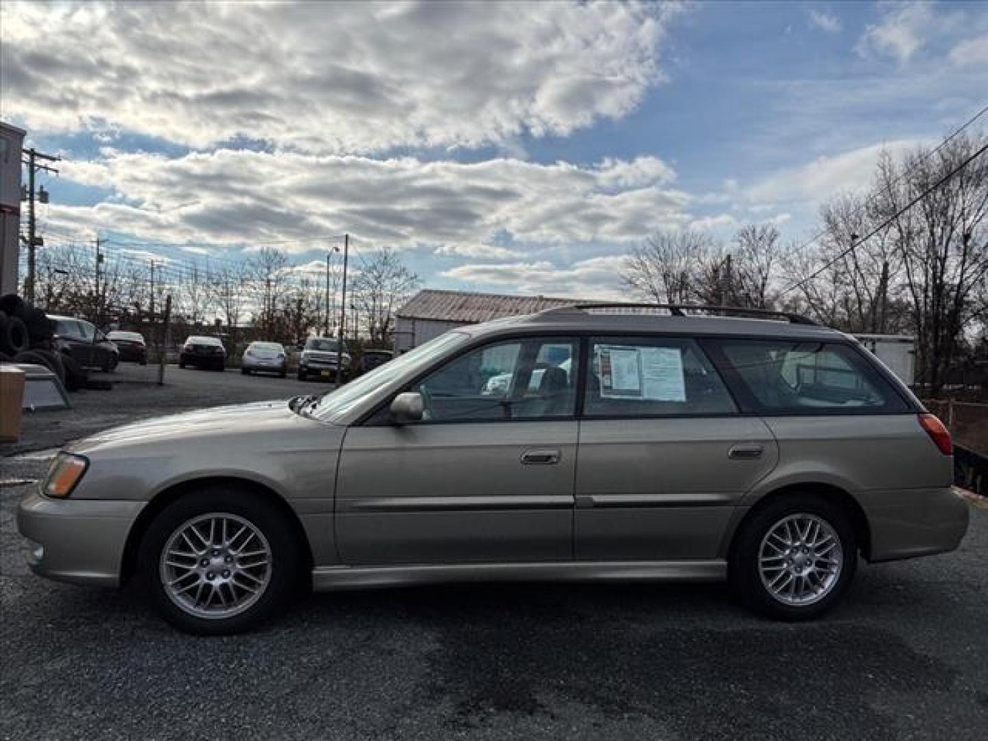 2002 Champagne Subaru Legacy GT (4S3BH645527) with an 2.5L 4 Cylinder Fuel Injected engine, ATAWD transmission, located at 50 Eastern Blvd., Essex, MD, 21221, (410) 686-3444, 39.304367, -76.484947 - Photo#1