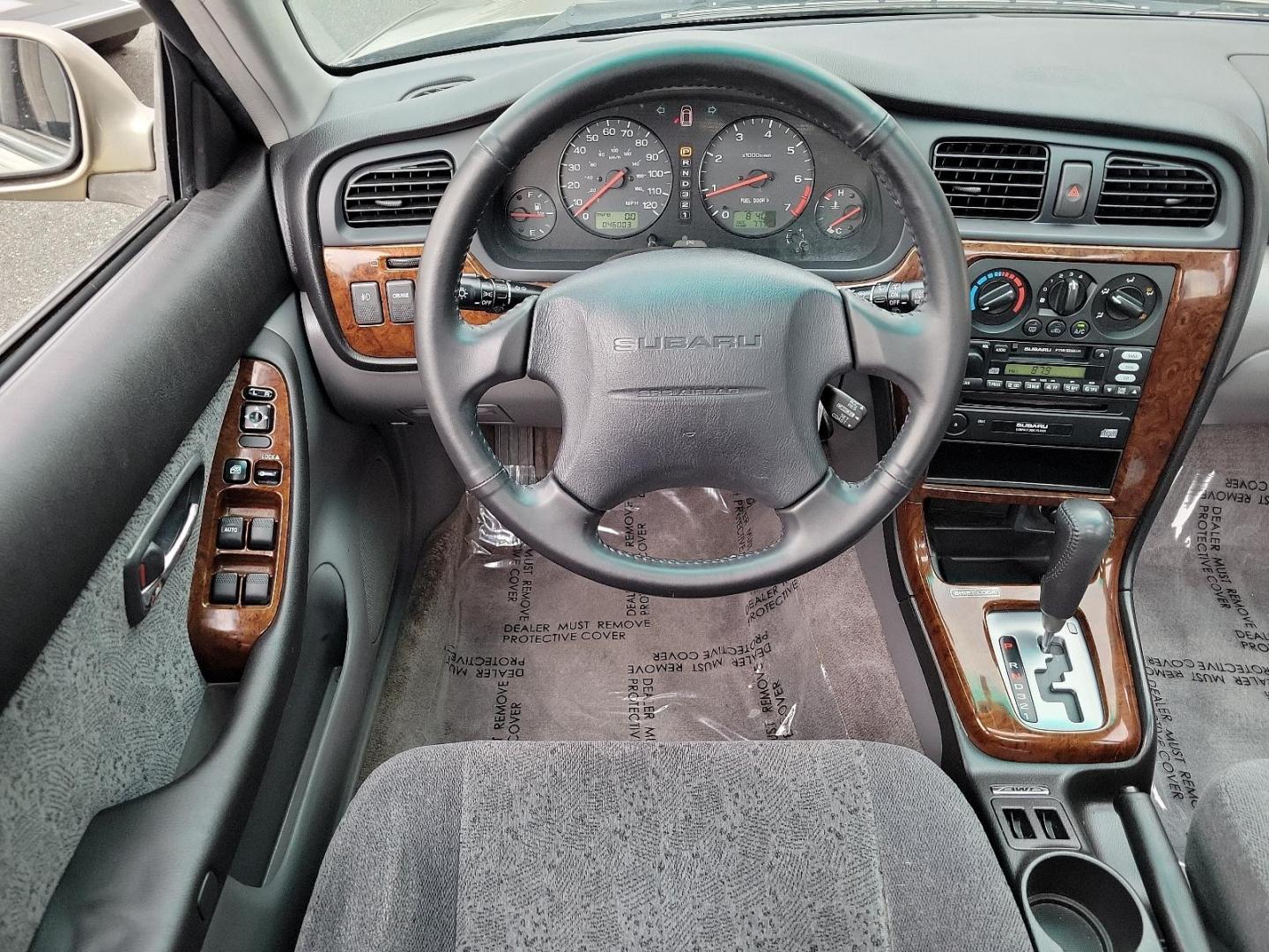 2002 Titanium Pearl - /Dark Gray - Subaru Legacy Wagon GT (4S3BH645527) with an 2.5L SOHC SMPI 16-valve 4-cyl horizontally opposed boxer engine engine, located at 50 Eastern Blvd., Essex, MD, 21221, (410) 686-3444, 39.304367, -76.484947 - Discover the joy of driving in this impressively maintained 2002 Subaru Legacy Wagon GT. Bathed in a sophisticated champagne exterior, this 5-door automatic vehicle boasts both style and durability. At its heart is a powerful 2.5L SOHC SMPI 16-valve 4-cylinder horizontally opposed boxer engine that - Photo#10