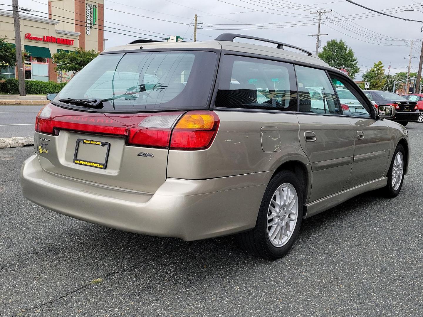 2002 Titanium Pearl - /Dark Gray - Subaru Legacy Wagon GT (4S3BH645527) with an 2.5L SOHC SMPI 16-valve 4-cyl horizontally opposed boxer engine engine, located at 50 Eastern Blvd., Essex, MD, 21221, (410) 686-3444, 39.304367, -76.484947 - Discover the joy of driving in this impressively maintained 2002 Subaru Legacy Wagon GT. Bathed in a sophisticated champagne exterior, this 5-door automatic vehicle boasts both style and durability. At its heart is a powerful 2.5L SOHC SMPI 16-valve 4-cylinder horizontally opposed boxer engine that - Photo#5