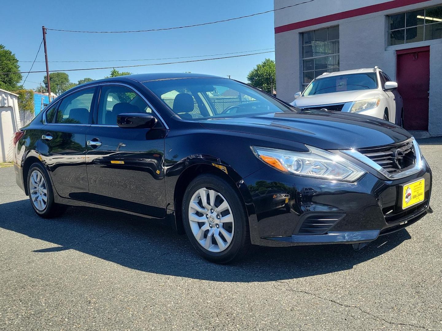 2018 Super Black - KH3 /Charcoal - G Nissan Altima 2.5 S (1N4AL3AP2JC) with an Engine: 2.5L DOHC 16-Valve 4-Cylinder engine, located at 50 Eastern Blvd., Essex, MD, 21221, (410) 686-3444, 39.304367, -76.484947 - Immerse yourself in the refined styling of our 2018 Nissan Altima 2.5 S Sedan, showcased in a stunning Super Black - KH3 exterior paired with a plush Charcoal - G interior. Under its sleek hood, this sedan hosts a powerful 2.5L DOHC 16-Valve 4-Cylinder engine that offers unmatched performance and ef - Photo#2