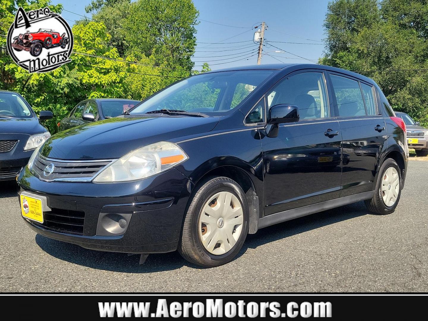 2010 Super Black - KH3 /Charcoal - G Nissan Versa 1.8 S (3N1BC1CP3AL) with an 1.8L DOHC 16-valve CVTCS I4 engine engine, located at 50 Eastern Blvd., Essex, MD, 21221, (410) 686-3444, 39.304367, -76.484947 - Meet the 2010 Nissan Versa 1.8 S 5DR HB I4 Auto 1.8 S, a sophisticated blend of performance, efficiency, and style. Powered by a 1.8L DOHC 16-valve CVTCS I4 engine, this dynamo exudes confidence on every road exerting unrivaled horsepower and torque. Its Super Black - KH3 exterior is a testament to - Photo#0