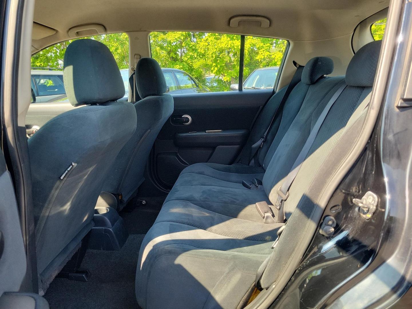 2010 Super Black - KH3 /Charcoal - G Nissan Versa 1.8 S (3N1BC1CP3AL) with an 1.8L DOHC 16-valve CVTCS I4 engine engine, located at 50 Eastern Blvd., Essex, MD, 21221, (410) 686-3444, 39.304367, -76.484947 - Meet the 2010 Nissan Versa 1.8 S 5DR HB I4 Auto 1.8 S, a sophisticated blend of performance, efficiency, and style. Powered by a 1.8L DOHC 16-valve CVTCS I4 engine, this dynamo exudes confidence on every road exerting unrivaled horsepower and torque. Its Super Black - KH3 exterior is a testament to - Photo#9