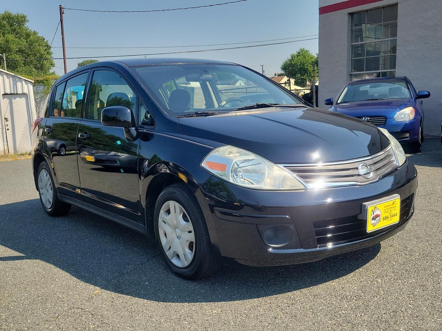 2010 Super Black - KH3 /Charcoal - G Nissan Versa 1.8 S (3N1BC1CP3AL) with an 1.8L DOHC 16-valve CVTCS I4 engine engine, located at 50 Eastern Blvd., Essex, MD, 21221, (410) 686-3444, 39.304367, -76.484947 - Meet the 2010 Nissan Versa 1.8 S 5DR HB I4 Auto 1.8 S, a sophisticated blend of performance, efficiency, and style. Powered by a 1.8L DOHC 16-valve CVTCS I4 engine, this dynamo exudes confidence on every road exerting unrivaled horsepower and torque. Its Super Black - KH3 exterior is a testament to - Photo#2