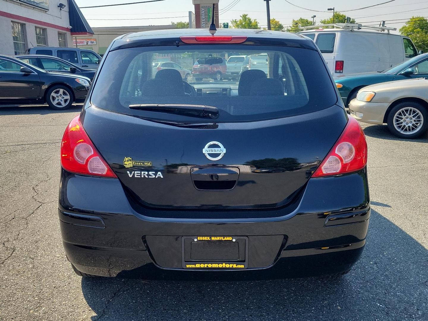 2010 Super Black - KH3 /Charcoal - G Nissan Versa 1.8 S (3N1BC1CP3AL) with an 1.8L DOHC 16-valve CVTCS I4 engine engine, located at 50 Eastern Blvd., Essex, MD, 21221, (410) 686-3444, 39.304367, -76.484947 - Meet the 2010 Nissan Versa 1.8 S 5DR HB I4 Auto 1.8 S, a sophisticated blend of performance, efficiency, and style. Powered by a 1.8L DOHC 16-valve CVTCS I4 engine, this dynamo exudes confidence on every road exerting unrivaled horsepower and torque. Its Super Black - KH3 exterior is a testament to - Photo#4