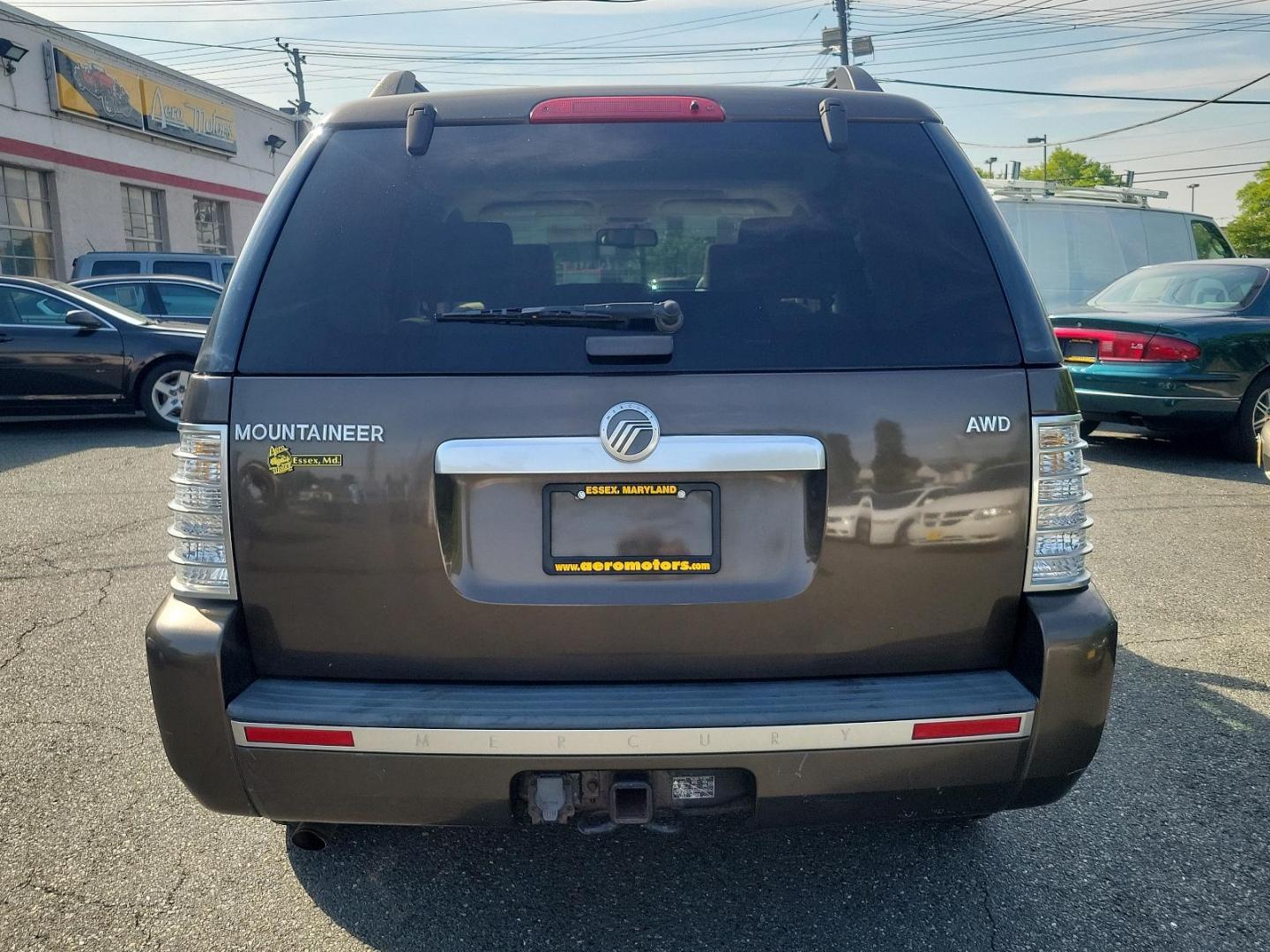 2008 White Chocolate Tri-Coat - PV /Camel - C Mercury Mountaineer (4M2EU47E38U) with an 4.0L SOHC 12-VALVE V6 ENGINE engine, located at 50 Eastern Blvd., Essex, MD, 21221, (410) 686-3444, 39.304367, -76.484947 - Presenting a stunning 2008 Mercury Mountaineer AWD 4Dr V6, a blend of power, luxury, and style. This captivating vehicle, with its gorgeous White Chocolate Tri-Coat PV exterior, turns heads everywhere it goes. The chic, camel-colored interior radiates a vibe of elegance while also ensuring an indulg - Photo#4