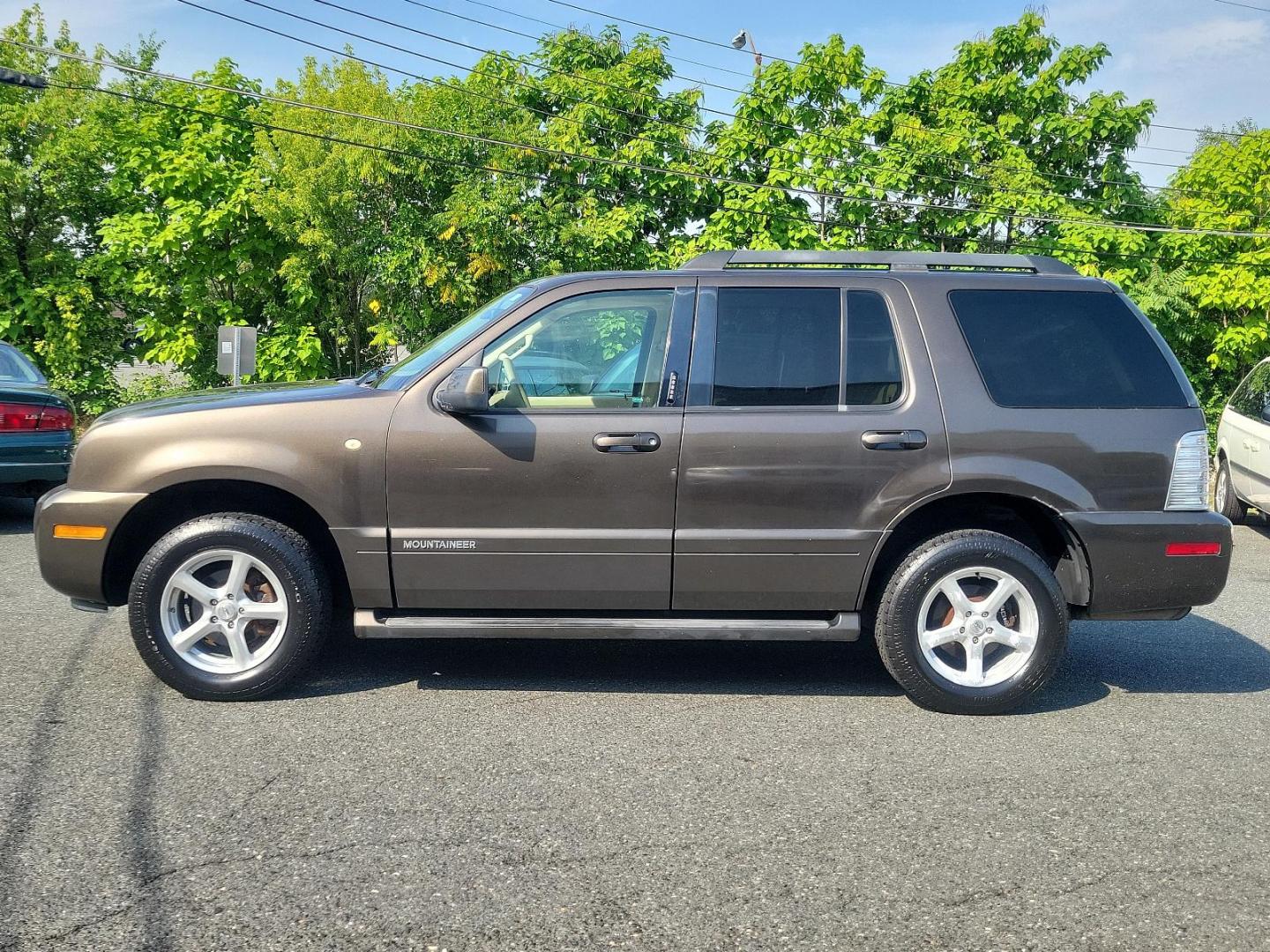 2008 White Chocolate Tri-Coat - PV /Camel - C Mercury Mountaineer (4M2EU47E38U) with an 4.0L SOHC 12-VALVE V6 ENGINE engine, located at 50 Eastern Blvd., Essex, MD, 21221, (410) 686-3444, 39.304367, -76.484947 - Presenting a stunning 2008 Mercury Mountaineer AWD 4Dr V6, a blend of power, luxury, and style. This captivating vehicle, with its gorgeous White Chocolate Tri-Coat PV exterior, turns heads everywhere it goes. The chic, camel-colored interior radiates a vibe of elegance while also ensuring an indulg - Photo#6