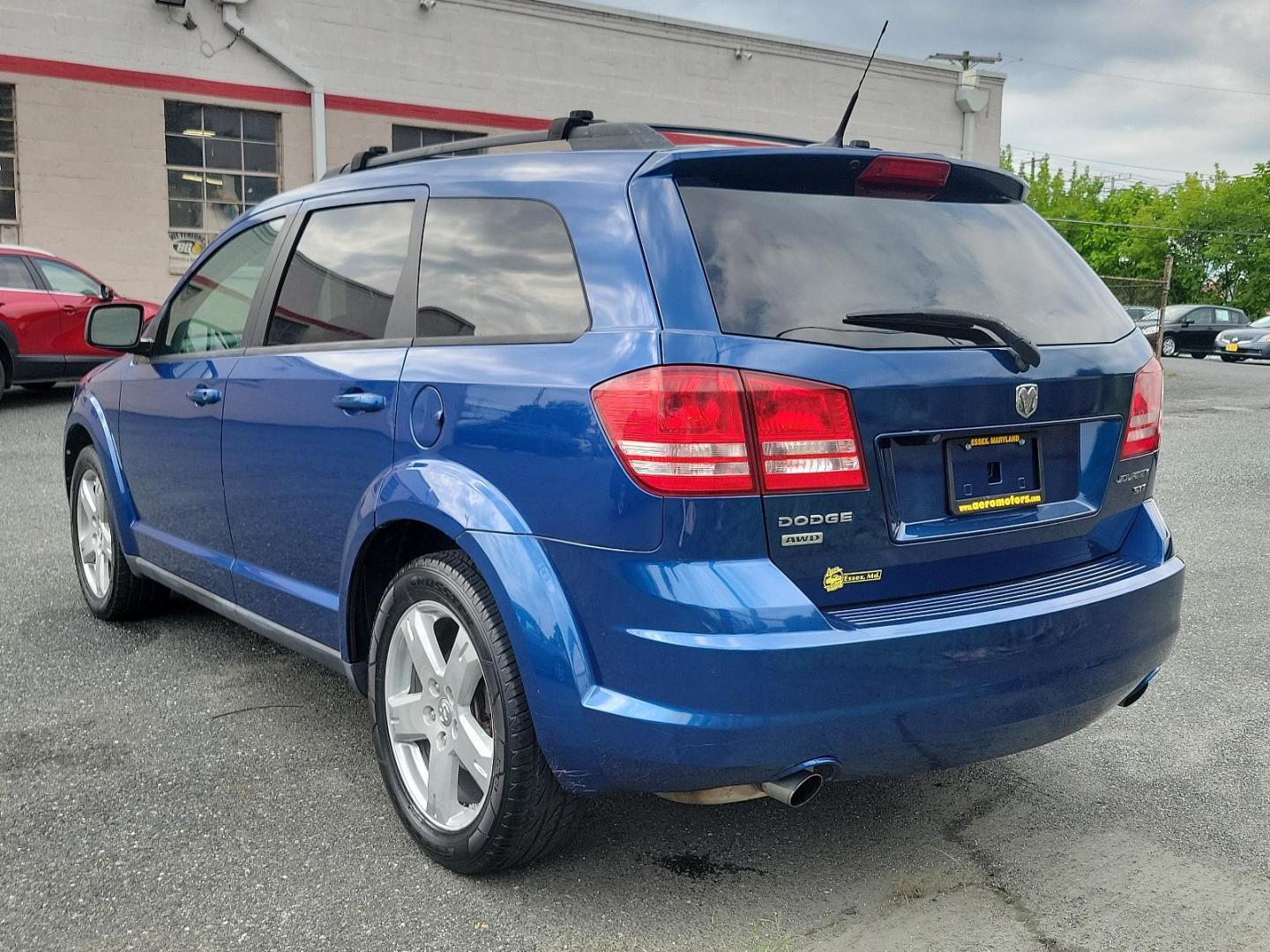 2010 Deep Water Blue Pearl - PBS /Dark Slate Gray - D7DV Dodge Journey SXT (3D4PH5FV9AT) with an 3.5L MPI 24-VALVE HO V6 ENGINE engine, located at 50 Eastern Blvd., Essex, MD, 21221, (410) 686-3444, 39.304367, -76.484947 - Presenting a distinguished 2010 Dodge Journey SXT AWD 4dr SXT, exuding an appealing finesse with its Deep Water Blue Pearl exterior. The interior, designed with Dark Slate Gray tones, reinforces a refined elegance. This vehicle is engineered with a powerful 3.5l MPI 24-valve HO V6 engine, ensuring a - Photo#2