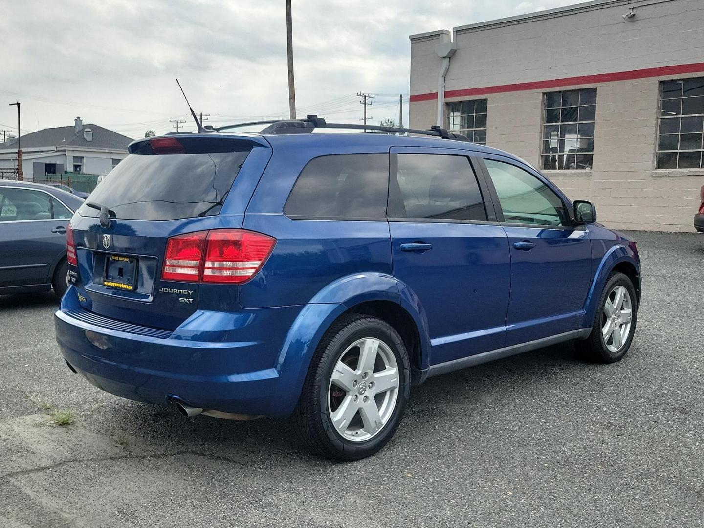 2010 Deep Water Blue Pearl - PBS /Dark Slate Gray - D7DV Dodge Journey SXT (3D4PH5FV9AT) with an 3.5L MPI 24-VALVE HO V6 ENGINE engine, located at 50 Eastern Blvd., Essex, MD, 21221, (410) 686-3444, 39.304367, -76.484947 - Presenting a distinguished 2010 Dodge Journey SXT AWD 4dr SXT, exuding an appealing finesse with its Deep Water Blue Pearl exterior. The interior, designed with Dark Slate Gray tones, reinforces a refined elegance. This vehicle is engineered with a powerful 3.5l MPI 24-valve HO V6 engine, ensuring a - Photo#3