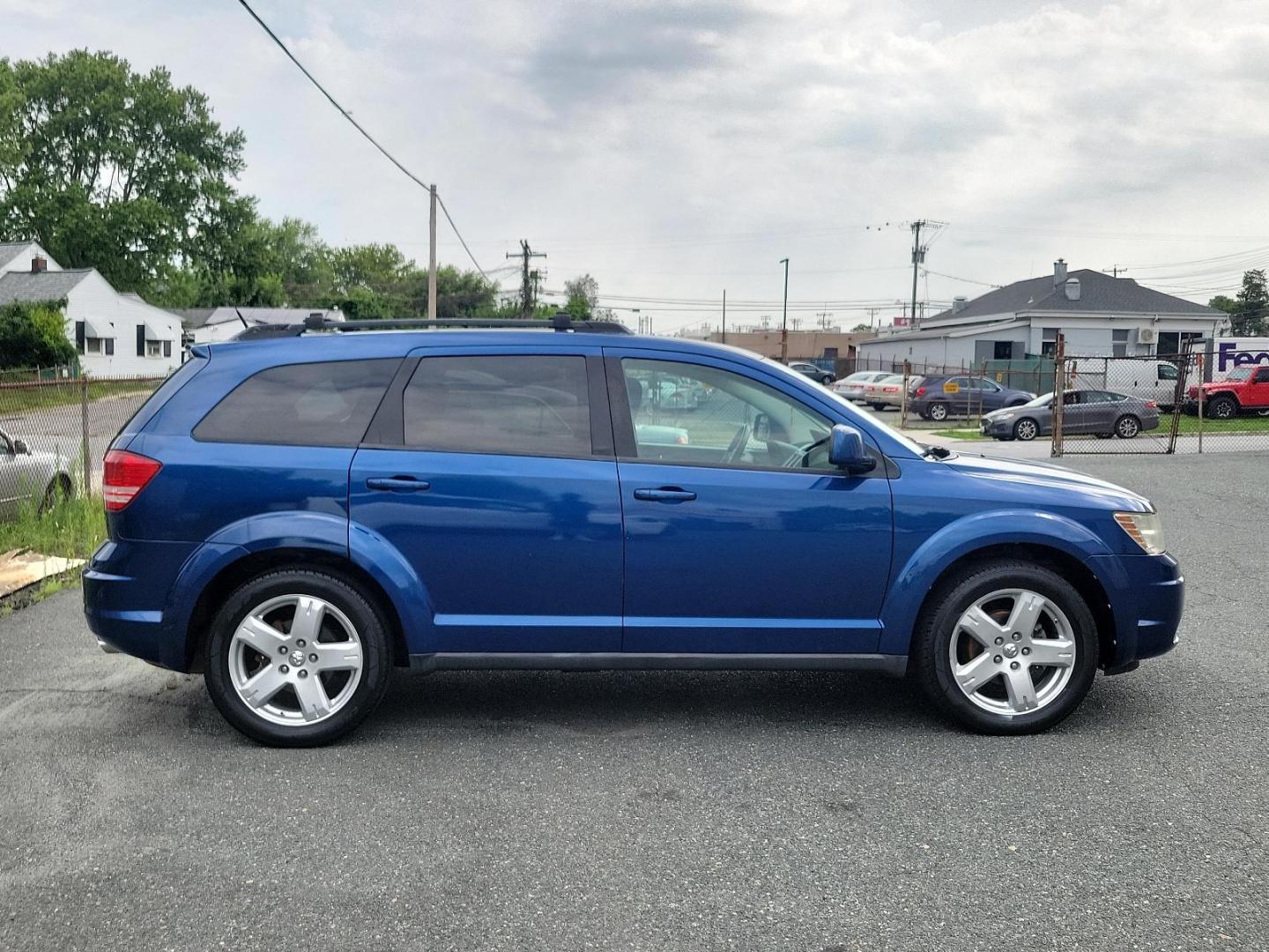 2010 Deep Water Blue Pearl - PBS /Dark Slate Gray - D7DV Dodge Journey SXT (3D4PH5FV9AT) with an 3.5L MPI 24-VALVE HO V6 ENGINE engine, located at 50 Eastern Blvd., Essex, MD, 21221, (410) 686-3444, 39.304367, -76.484947 - Presenting a distinguished 2010 Dodge Journey SXT AWD 4dr SXT, exuding an appealing finesse with its Deep Water Blue Pearl exterior. The interior, designed with Dark Slate Gray tones, reinforces a refined elegance. This vehicle is engineered with a powerful 3.5l MPI 24-valve HO V6 engine, ensuring a - Photo#4