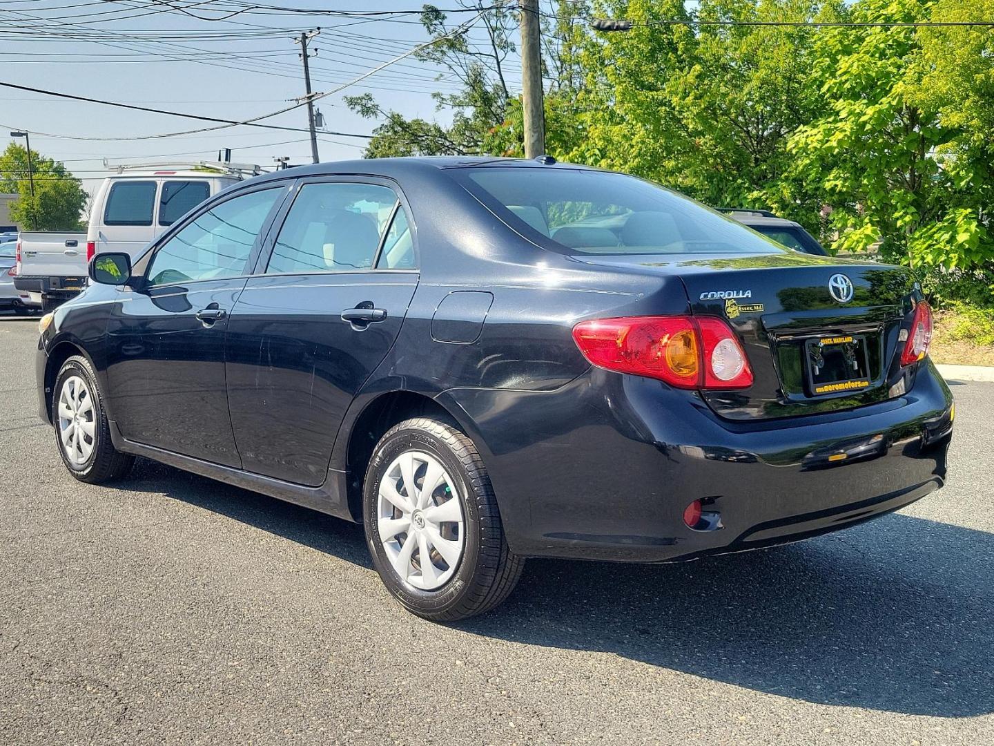 2010 Black Sand Pearl - 209 /Ash - FC16 Toyota Corolla LE (2T1BU4EE5AC) with an 1.8L DOHC SFI 16-valve VVT-i 4-cyl engine engine, located at 50 Eastern Blvd., Essex, MD, 21221, (410) 686-3444, 39.304367, -76.484947 - Introducing the sophisticated 2010 Toyota Corolla LE 4dr sedan, finished in a stunning Black Sand Pearl - 209 exterior that's perfectly complemented by an Ash - FC16 interior. Powered by a fuel-efficient 1.8L DOHC SFI 16-valve VVT-I 4-cylinder engine, this sleek vehicle masterfully combines performa - Photo#5