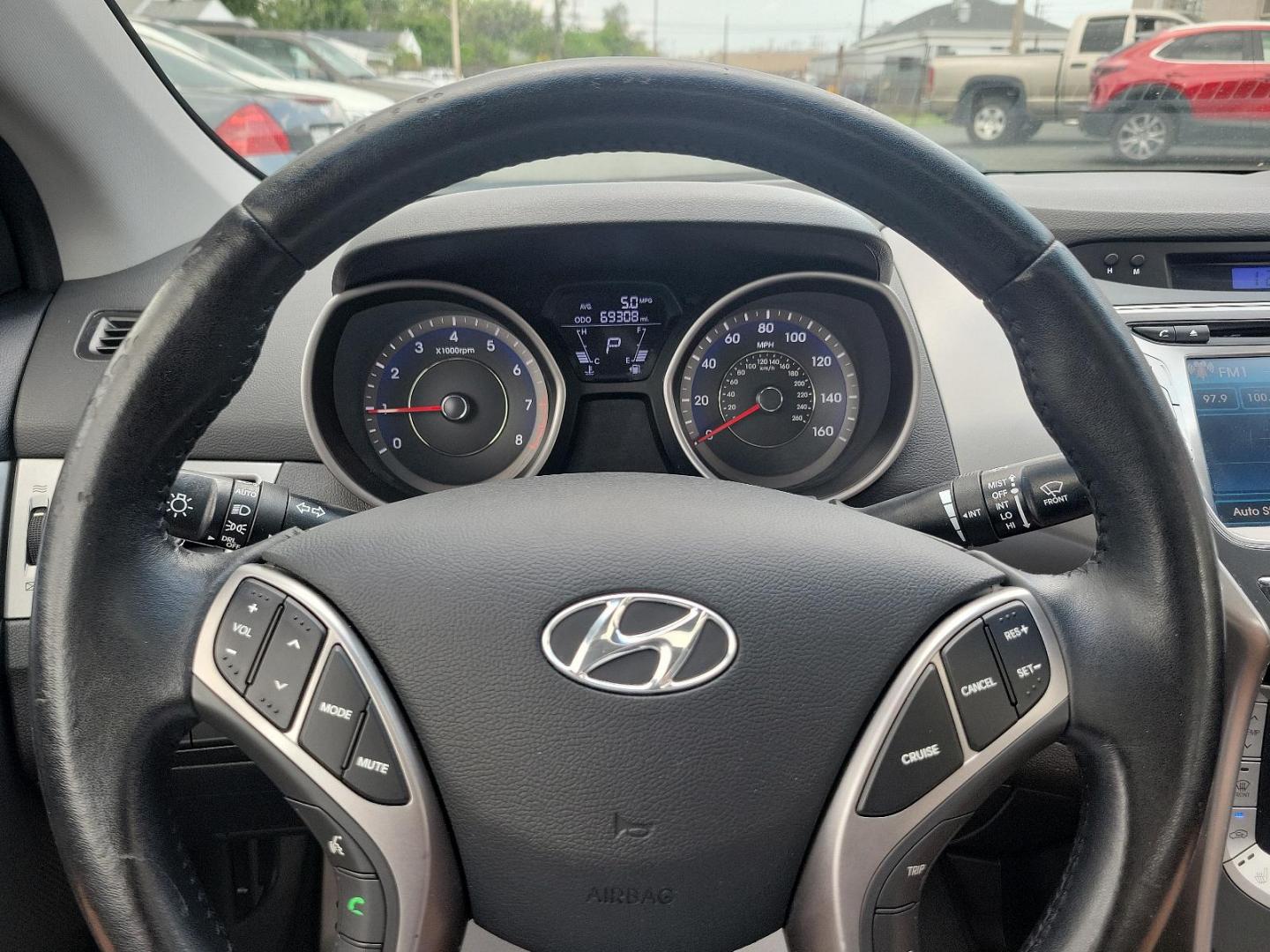 2013 Atlantic Blue - S7U /Black - RY Hyundai Elantra Coupe SE (KMHDH6AE8DU) with an 1.8L DOHC MPFI D-CVVT 16-valve I4 engine engine, located at 50 Eastern Blvd., Essex, MD, 21221, (410) 686-3444, 39.304367, -76.484947 - Introducing the 2013 Hyundai Elantra Coupe SE 2dr Auto SE PZEV, a luxurious blend of style, efficiency, and performance. This sleek model boasts an alluring Atlantic Blue exterior paired with a sophisticated black interior. Under the hood, you'll discover a powerful 1.8L DOHC MPFI D-CVVT 16-Valve I4 - Photo#16