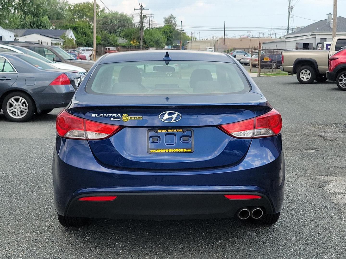 2013 Atlantic Blue - S7U /Black - RY Hyundai Elantra Coupe SE (KMHDH6AE8DU) with an 1.8L DOHC MPFI D-CVVT 16-valve I4 engine engine, located at 50 Eastern Blvd., Essex, MD, 21221, (410) 686-3444, 39.304367, -76.484947 - Introducing the 2013 Hyundai Elantra Coupe SE 2dr Auto SE PZEV, a luxurious blend of style, efficiency, and performance. This sleek model boasts an alluring Atlantic Blue exterior paired with a sophisticated black interior. Under the hood, you'll discover a powerful 1.8L DOHC MPFI D-CVVT 16-Valve I4 - Photo#4