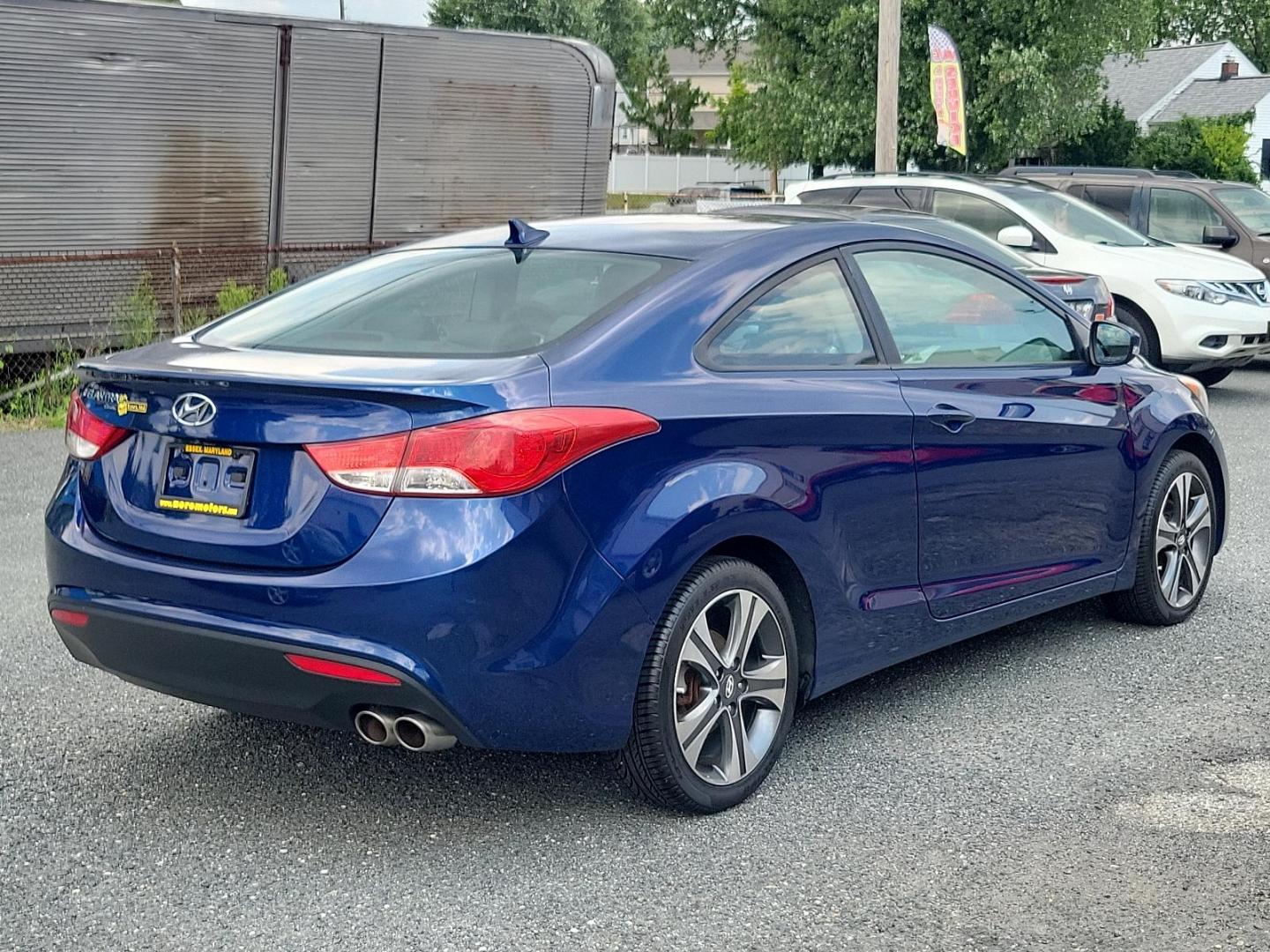 2013 Atlantic Blue - S7U /Black - RY Hyundai Elantra Coupe SE (KMHDH6AE8DU) with an 1.8L DOHC MPFI D-CVVT 16-valve I4 engine engine, located at 50 Eastern Blvd., Essex, MD, 21221, (410) 686-3444, 39.304367, -76.484947 - Introducing the 2013 Hyundai Elantra Coupe SE 2dr Auto SE PZEV, a luxurious blend of style, efficiency, and performance. This sleek model boasts an alluring Atlantic Blue exterior paired with a sophisticated black interior. Under the hood, you'll discover a powerful 1.8L DOHC MPFI D-CVVT 16-Valve I4 - Photo#5