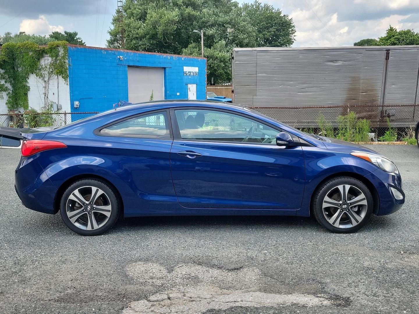 2013 Atlantic Blue - S7U /Black - RY Hyundai Elantra Coupe SE (KMHDH6AE8DU) with an 1.8L DOHC MPFI D-CVVT 16-valve I4 engine engine, located at 50 Eastern Blvd., Essex, MD, 21221, (410) 686-3444, 39.304367, -76.484947 - Introducing the 2013 Hyundai Elantra Coupe SE 2dr Auto SE PZEV, a luxurious blend of style, efficiency, and performance. This sleek model boasts an alluring Atlantic Blue exterior paired with a sophisticated black interior. Under the hood, you'll discover a powerful 1.8L DOHC MPFI D-CVVT 16-Valve I4 - Photo#6