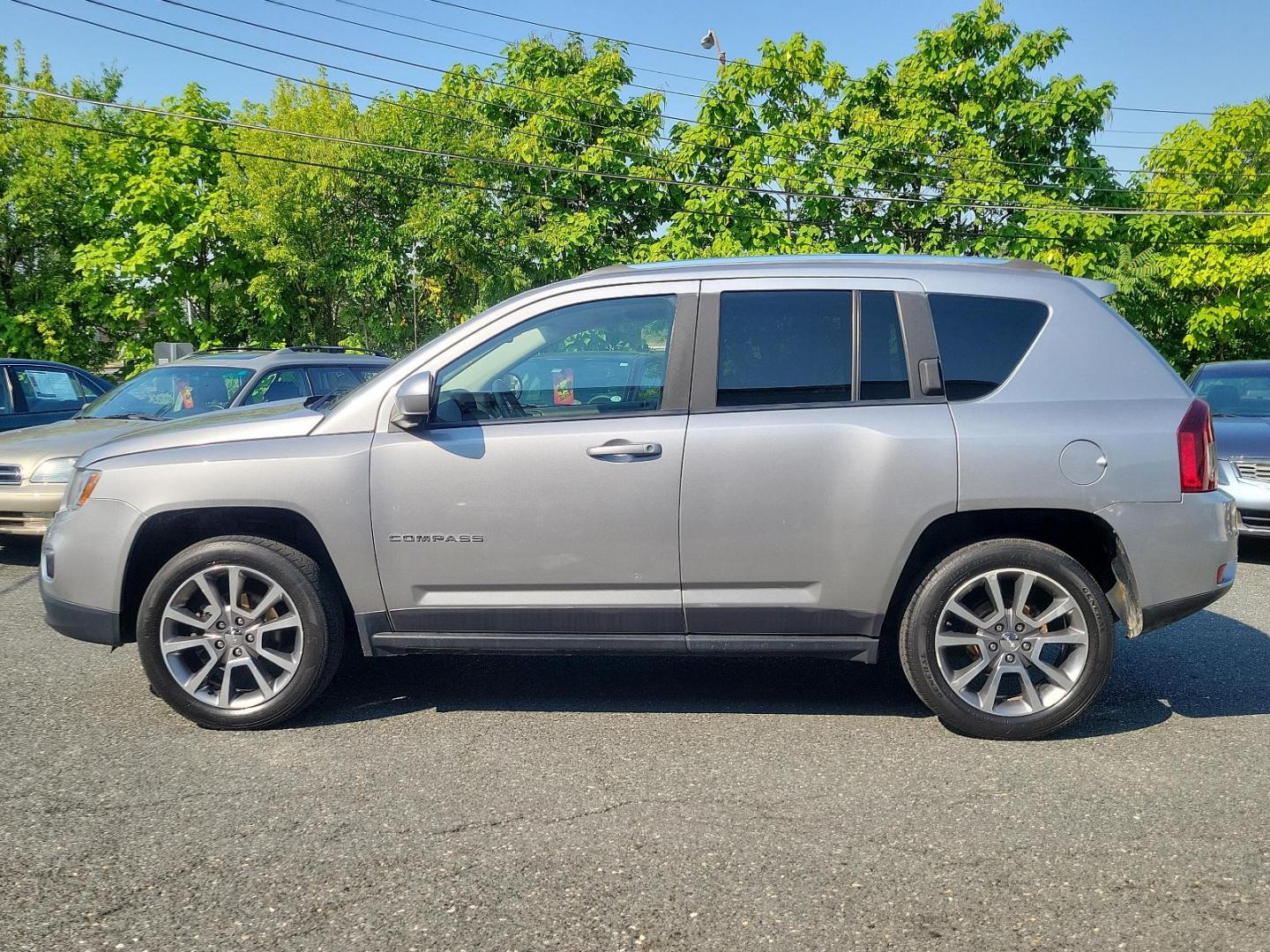 2016 Billet Silver Metallic Clearcoat - PSC /Saddle Tan/Dk Slate Gray - SLVT Jeep Compass High Altitude Edition (1C4NJDEB1GD) with an ENGINE: 2.4L I4 DOHC 16V DUAL VVT engine, located at 50 Eastern Blvd., Essex, MD, 21221, (410) 686-3444, 39.304367, -76.484947 - Presenting the sophisticated 2016 Jeep Compass High Altitude Edition. Clad in a stunning billet silver metallic clearcoat exterior, this 4WD, 4-door SUV captures attention on every journey. The interior is equally impressive, showcasing a luxurious saddle tan/dark slate gray color scheme. Under the - Photo#6