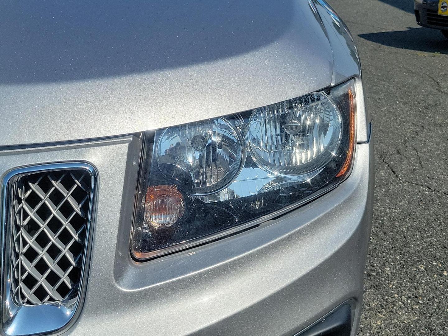 2016 Billet Silver Metallic Clearcoat - PSC /Saddle Tan/Dk Slate Gray - SLVT Jeep Compass High Altitude Edition (1C4NJDEB1GD) with an ENGINE: 2.4L I4 DOHC 16V DUAL VVT engine, located at 50 Eastern Blvd., Essex, MD, 21221, (410) 686-3444, 39.304367, -76.484947 - Presenting the sophisticated 2016 Jeep Compass High Altitude Edition. Clad in a stunning billet silver metallic clearcoat exterior, this 4WD, 4-door SUV captures attention on every journey. The interior is equally impressive, showcasing a luxurious saddle tan/dark slate gray color scheme. Under the - Photo#8