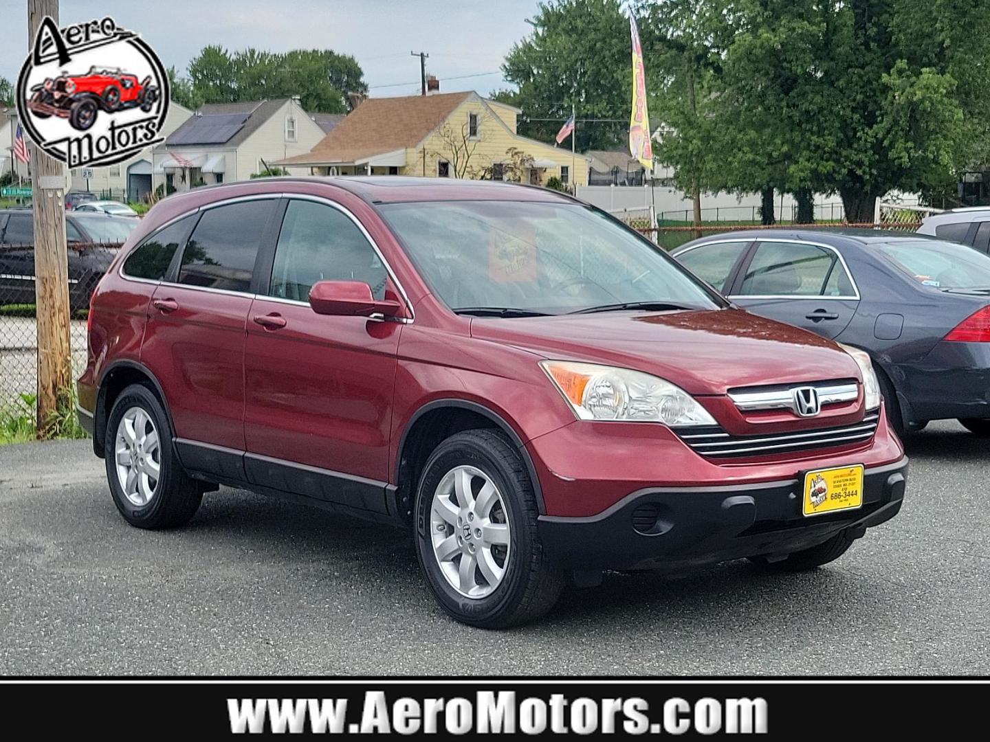 2007 Tango Red Pearl - RE /Gray - GR Honda CR-V EX-L (5J6RE48767L) with an 2.4L DOHC MPFI 16-valve i-VTEC I4 engine engine, located at 50 Eastern Blvd., Essex, MD, 21221, (410) 686-3444, 39.304367, -76.484947 - Discover the potential in this 2007 Honda CR-V EX-L. Embrace the robust performance and sleek design of this 4WD 5-dr EX-L coated with a fiery red exterior that turns heads every time you're on the road. At the heart of this stylish vehicle beats a powerful 2.4L DOHC MPFI 16-valve i-VTEC I4 engine, - Photo#0