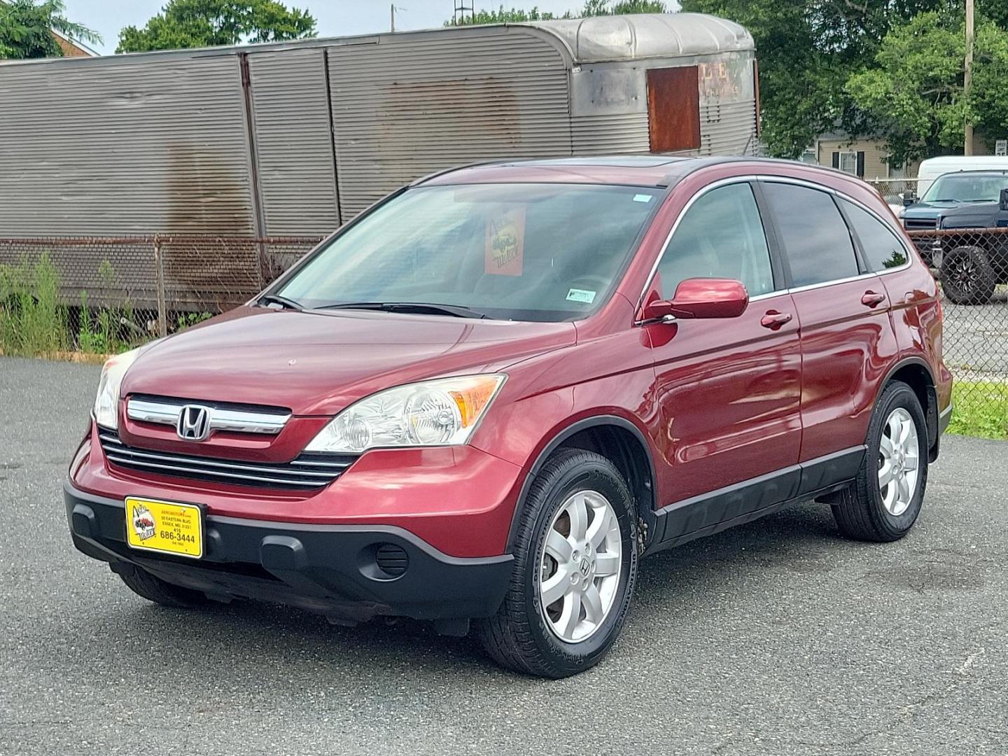 2007 Tango Red Pearl - RE /Gray - GR Honda CR-V EX-L (5J6RE48767L) with an 2.4L DOHC MPFI 16-valve i-VTEC I4 engine engine, located at 50 Eastern Blvd., Essex, MD, 21221, (410) 686-3444, 39.304367, -76.484947 - Discover the potential in this 2007 Honda CR-V EX-L. Embrace the robust performance and sleek design of this 4WD 5-dr EX-L coated with a fiery red exterior that turns heads every time you're on the road. At the heart of this stylish vehicle beats a powerful 2.4L DOHC MPFI 16-valve i-VTEC I4 engine, - Photo#1