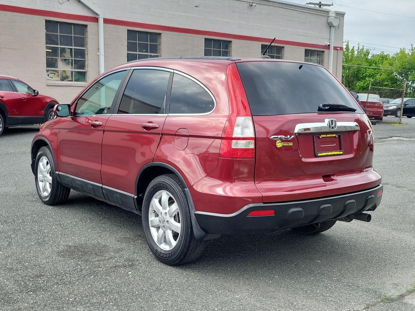 2007 Tango Red Pearl - RE /Gray - GR Honda CR-V EX-L (5J6RE48767L) with an 2.4L DOHC MPFI 16-valve i-VTEC I4 engine engine, located at 50 Eastern Blvd., Essex, MD, 21221, (410) 686-3444, 39.304367, -76.484947 - Discover the potential in this 2007 Honda CR-V EX-L. Embrace the robust performance and sleek design of this 4WD 5-dr EX-L coated with a fiery red exterior that turns heads every time you're on the road. At the heart of this stylish vehicle beats a powerful 2.4L DOHC MPFI 16-valve i-VTEC I4 engine, - Photo#2