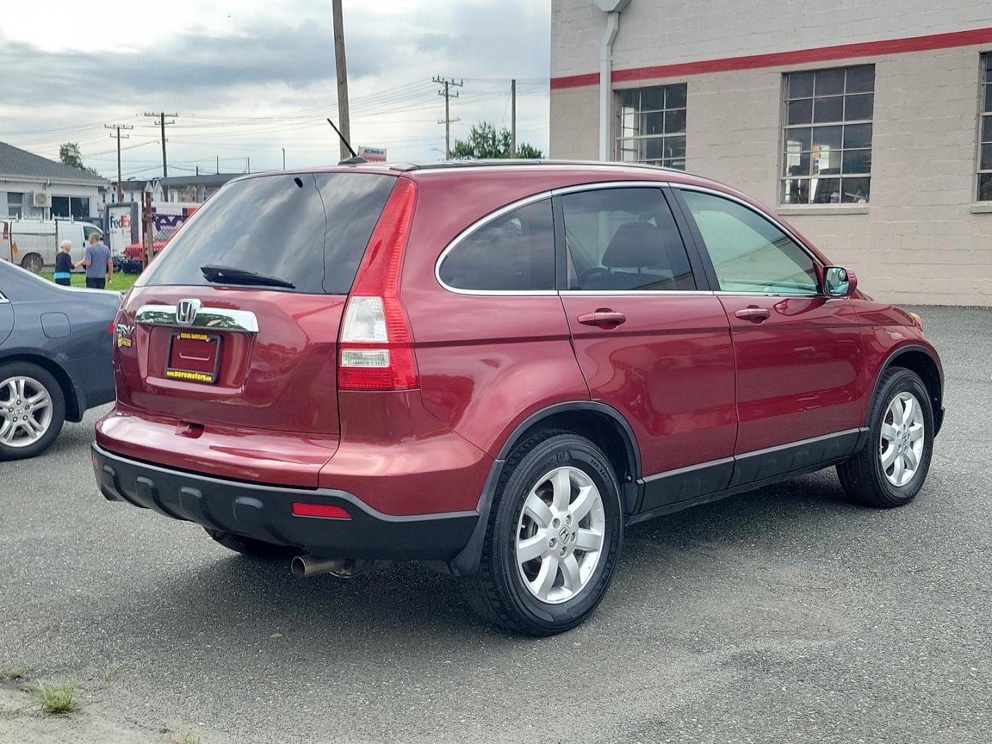 2007 Tango Red Pearl - RE /Gray - GR Honda CR-V EX-L (5J6RE48767L) with an 2.4L DOHC MPFI 16-valve i-VTEC I4 engine engine, located at 50 Eastern Blvd., Essex, MD, 21221, (410) 686-3444, 39.304367, -76.484947 - Discover the potential in this 2007 Honda CR-V EX-L. Embrace the robust performance and sleek design of this 4WD 5-dr EX-L coated with a fiery red exterior that turns heads every time you're on the road. At the heart of this stylish vehicle beats a powerful 2.4L DOHC MPFI 16-valve i-VTEC I4 engine, - Photo#3