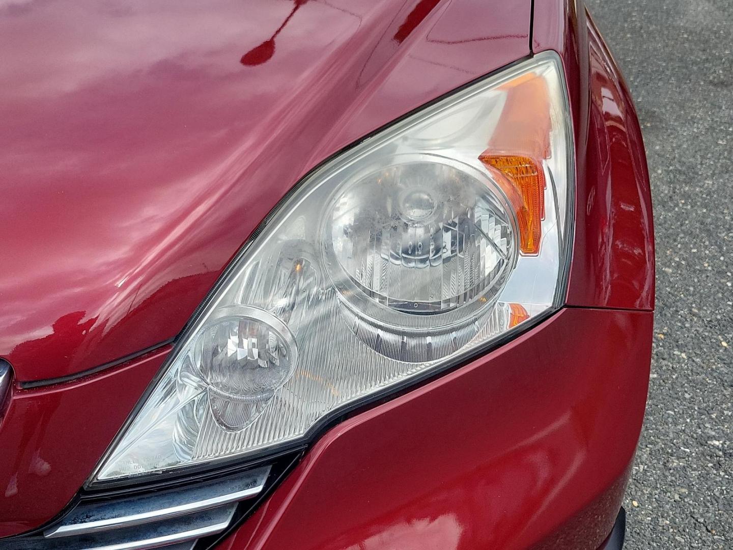 2007 Tango Red Pearl - RE /Gray - GR Honda CR-V EX-L (5J6RE48767L) with an 2.4L DOHC MPFI 16-valve i-VTEC I4 engine engine, located at 50 Eastern Blvd., Essex, MD, 21221, (410) 686-3444, 39.304367, -76.484947 - Discover the potential in this 2007 Honda CR-V EX-L. Embrace the robust performance and sleek design of this 4WD 5-dr EX-L coated with a fiery red exterior that turns heads every time you're on the road. At the heart of this stylish vehicle beats a powerful 2.4L DOHC MPFI 16-valve i-VTEC I4 engine, - Photo#6