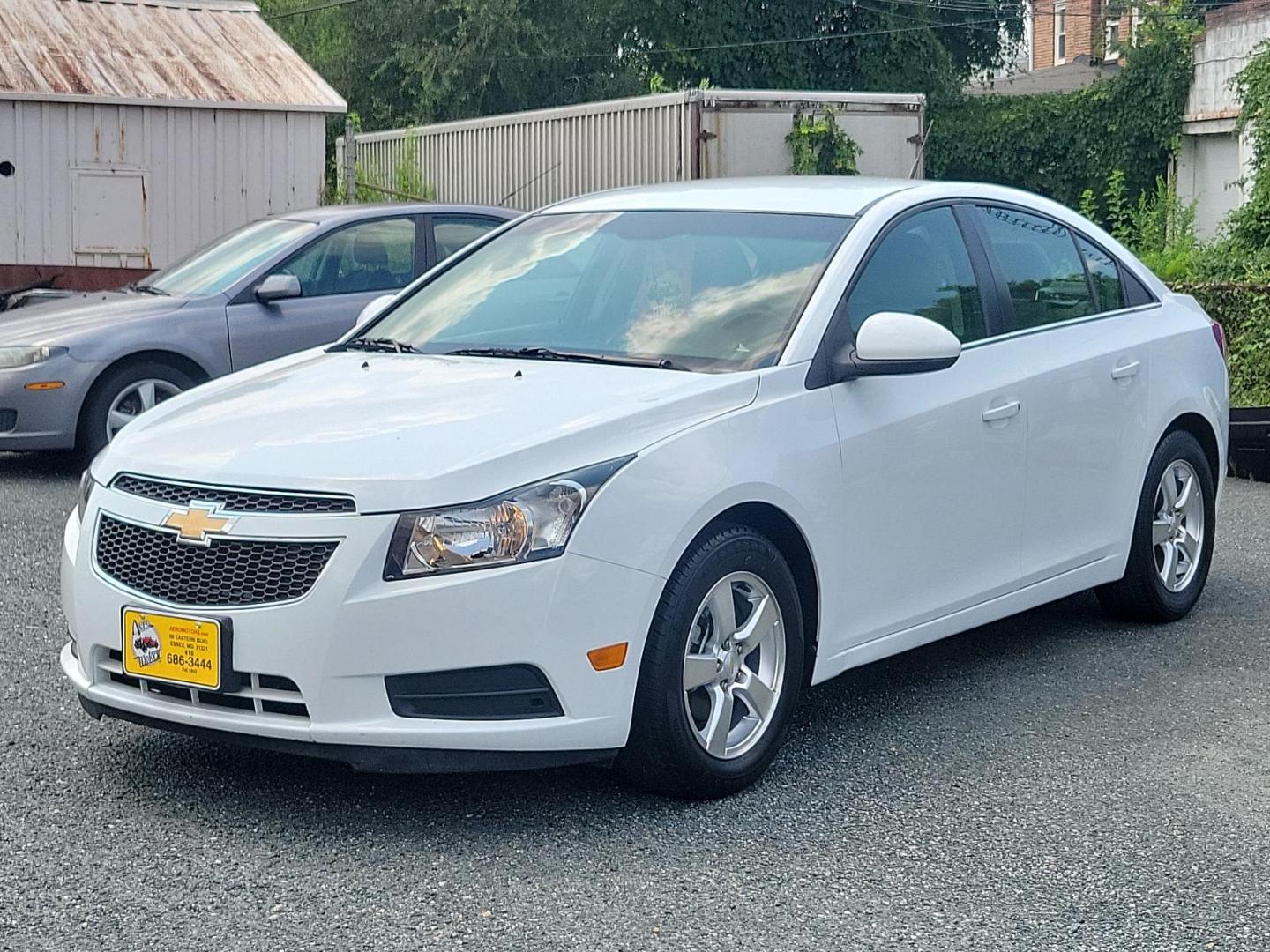 2011 Summit White - GAZ /Medium Titanium - AFC Chevrolet Cruze LT w/1LT (1G1PF5S90B7) with an ENGINE, ECOTEC TURBO 1.4L VARIABLE VALVE TIMING DOHC 4-CYLINDER SEQUENTIAL MFI, TURBO engine, located at 50 Eastern Blvd., Essex, MD, 21221, (410) 686-3444, 39.304367, -76.484947 - Experience unmatched performance and style with this 2011 Chevrolet Cruze LT w/1LT 4dr sdn lt w/1lt. Boasting a sleek summit white exterior coupled with a medium titanium interior, this vehicle exudes contemporary elegance. Under the hood, it is powered by an ecotec turbo 1.4l variable valve timing - Photo#2