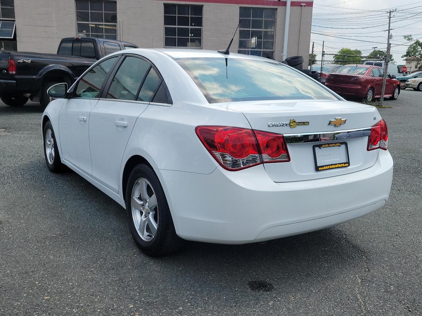 2011 Summit White - GAZ /Medium Titanium - AFC Chevrolet Cruze LT w/1LT (1G1PF5S90B7) with an ENGINE, ECOTEC TURBO 1.4L VARIABLE VALVE TIMING DOHC 4-CYLINDER SEQUENTIAL MFI, TURBO engine, located at 50 Eastern Blvd., Essex, MD, 21221, (410) 686-3444, 39.304367, -76.484947 - Experience unmatched performance and style with this 2011 Chevrolet Cruze LT w/1LT 4dr sdn lt w/1lt. Boasting a sleek summit white exterior coupled with a medium titanium interior, this vehicle exudes contemporary elegance. Under the hood, it is powered by an ecotec turbo 1.4l variable valve timing - Photo#3